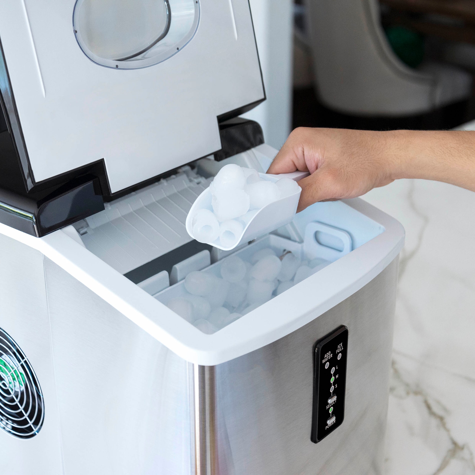 Máquina de hacer hielo tipo bala de acero inoxidable y negro para encimera o portátil que produce 28 libras de hielo por día.