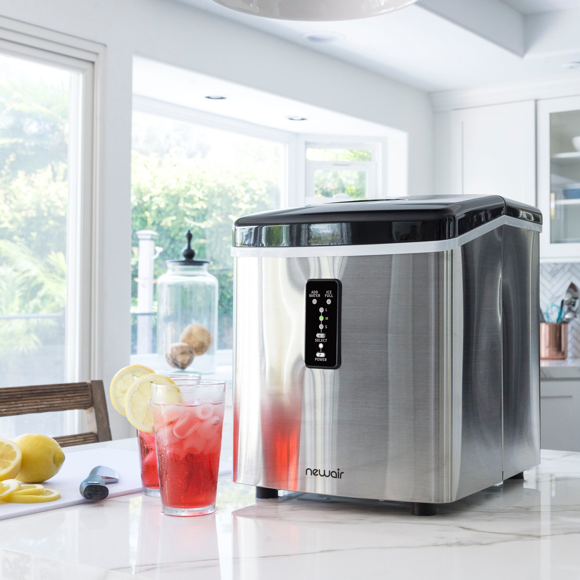 Máquina de hacer hielo tipo bala de acero inoxidable y negro para encimera o portátil que produce 28 libras de hielo por día.