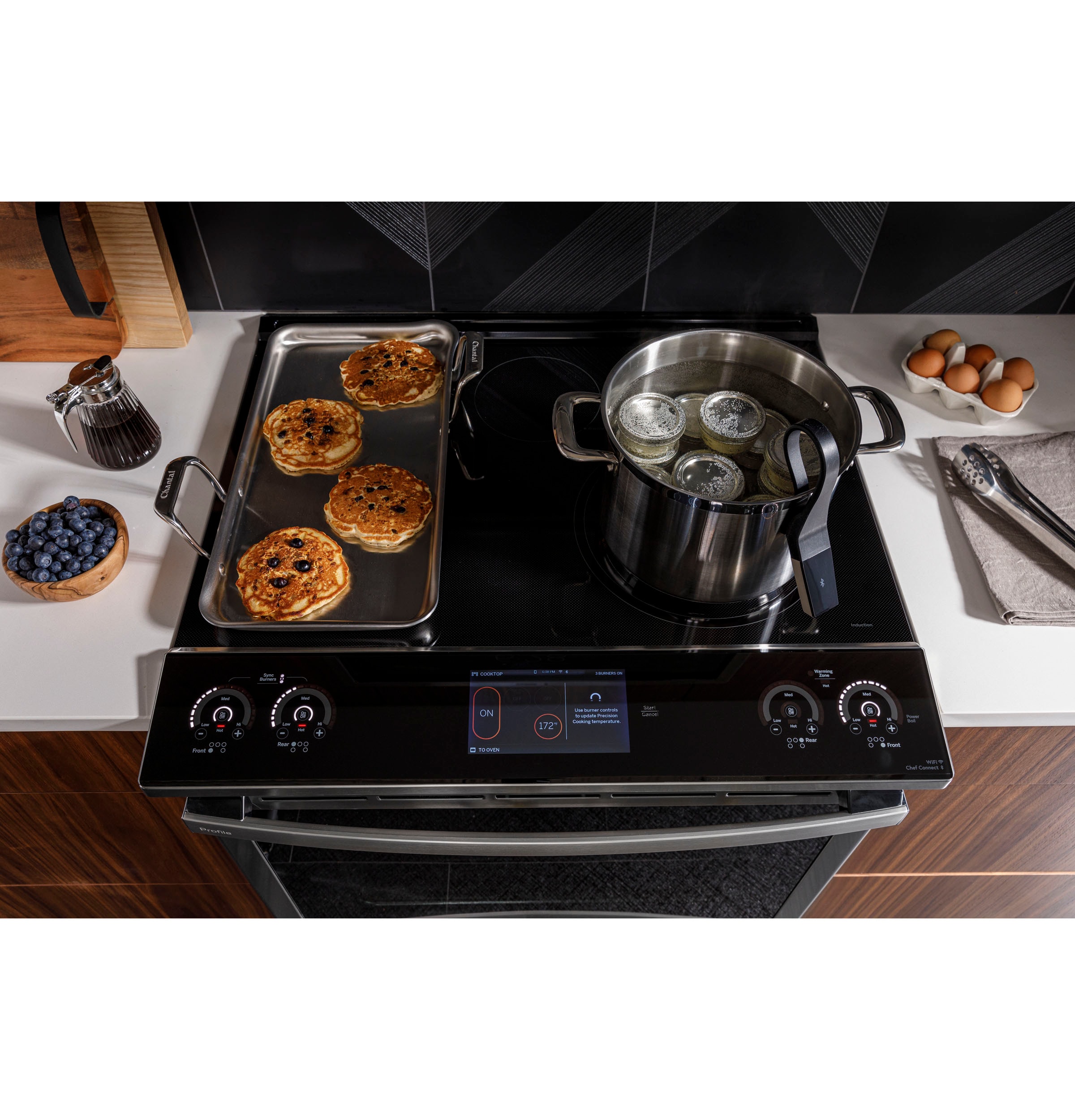 Estufa de Inducción Simple Deslizable con Horno de Convección de Aire y Freidora de 5 Quemadores de 30 pulgadas y 5.3 pies cúbicos - Acero Inoxidable Resistente a las Huellas Dactilares de la Línea GE Profile
