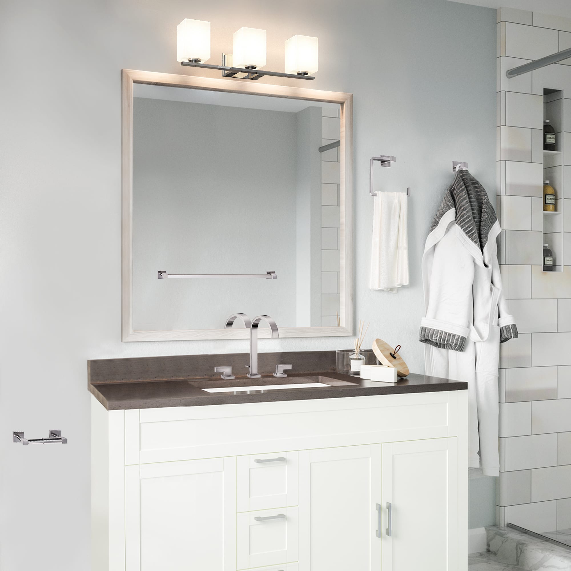 Set de accesorios para baño en cromo pulido de 4 piezas de Design House: Barra para toallas, portarrollos, argolla para toallas y gancho para batas incluidos 188540