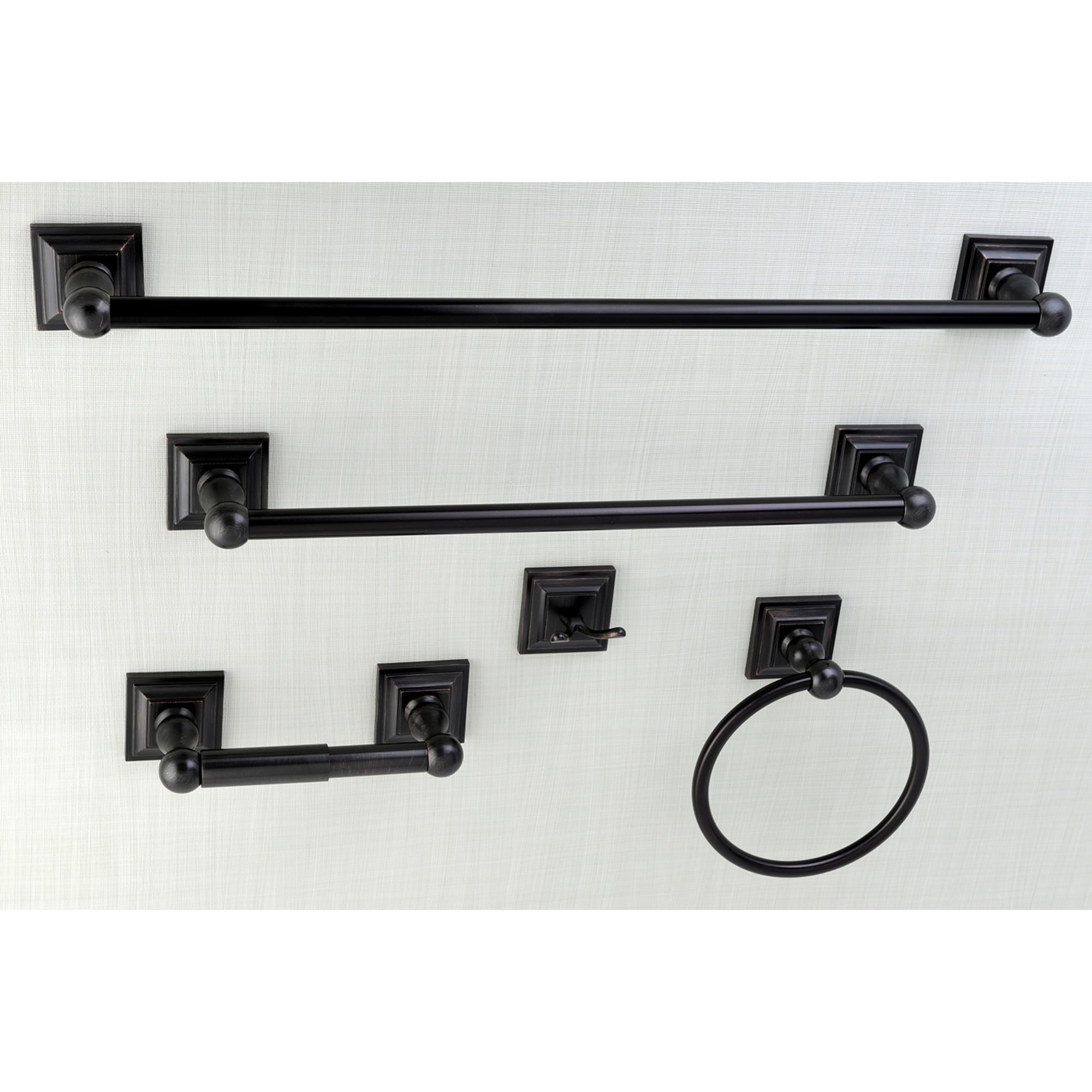 Set de Accesorios Decorativos para Baño en Bronce Aceitado Sereno de 5 Piezas de Kingston Brass: Barra de Toallas, Porta Papel, Argolla de Toalla y Gancho para Bata incluidos.