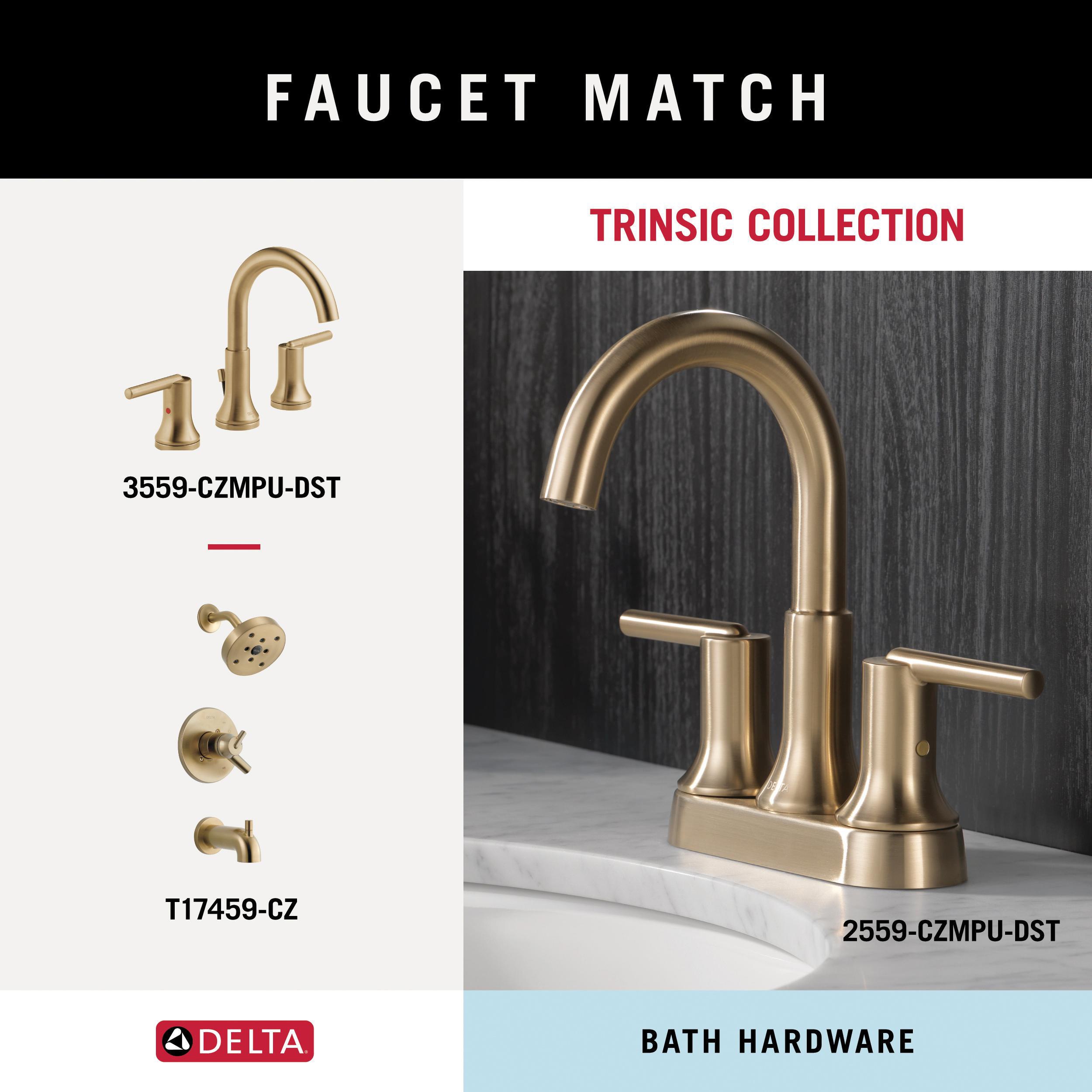 Set de accesorios para baño en acabado Champagne Bronze Trinsic de 4 piezas de Delta: Barra para toallas, portarrollos de papel higiénico, anillo para toallas, gancho para batas incluido TRN64-CZ-VK.