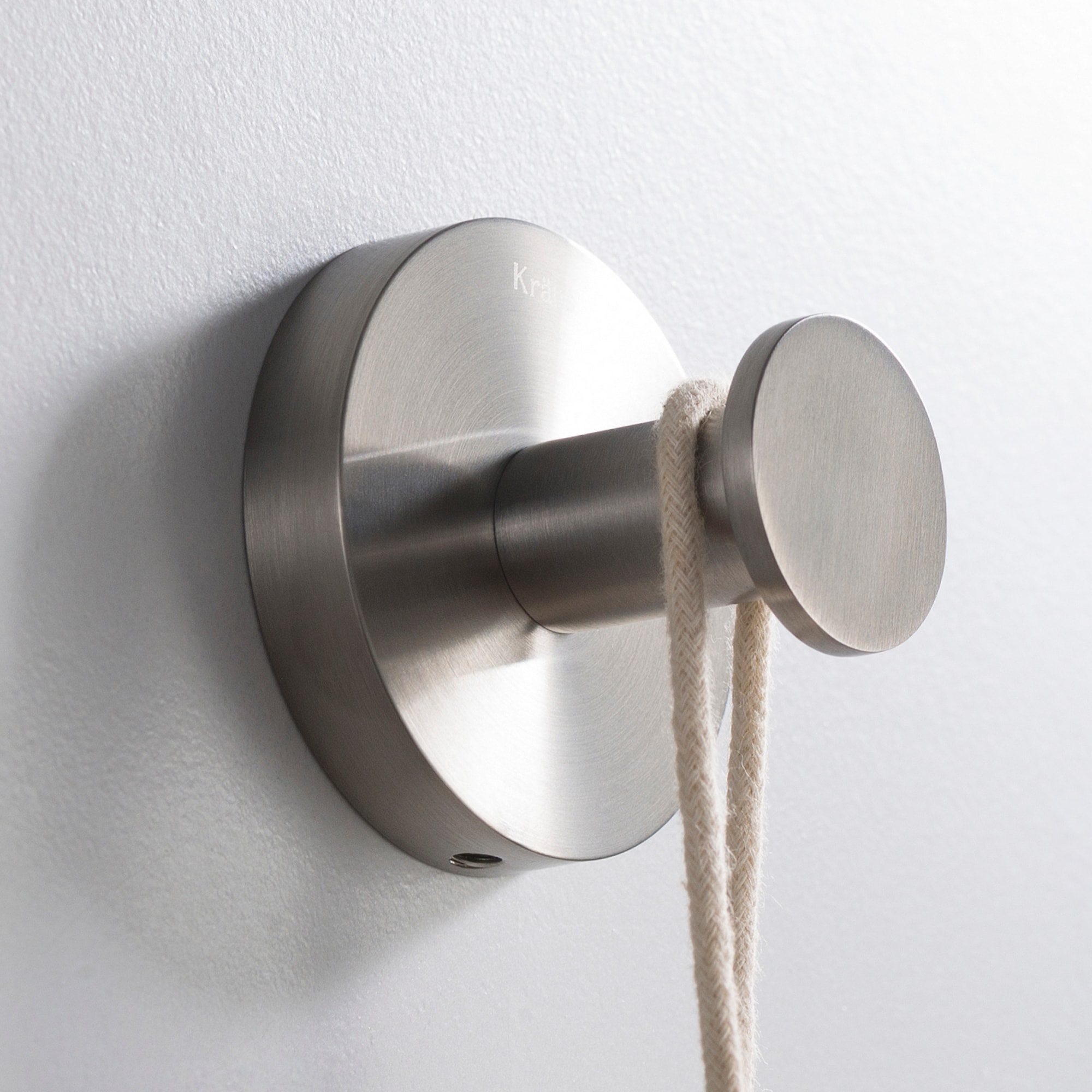 Percha para toallas de montaje en pared de níquel cepillado Kraus Elie - Gancho único KEA-18801BN