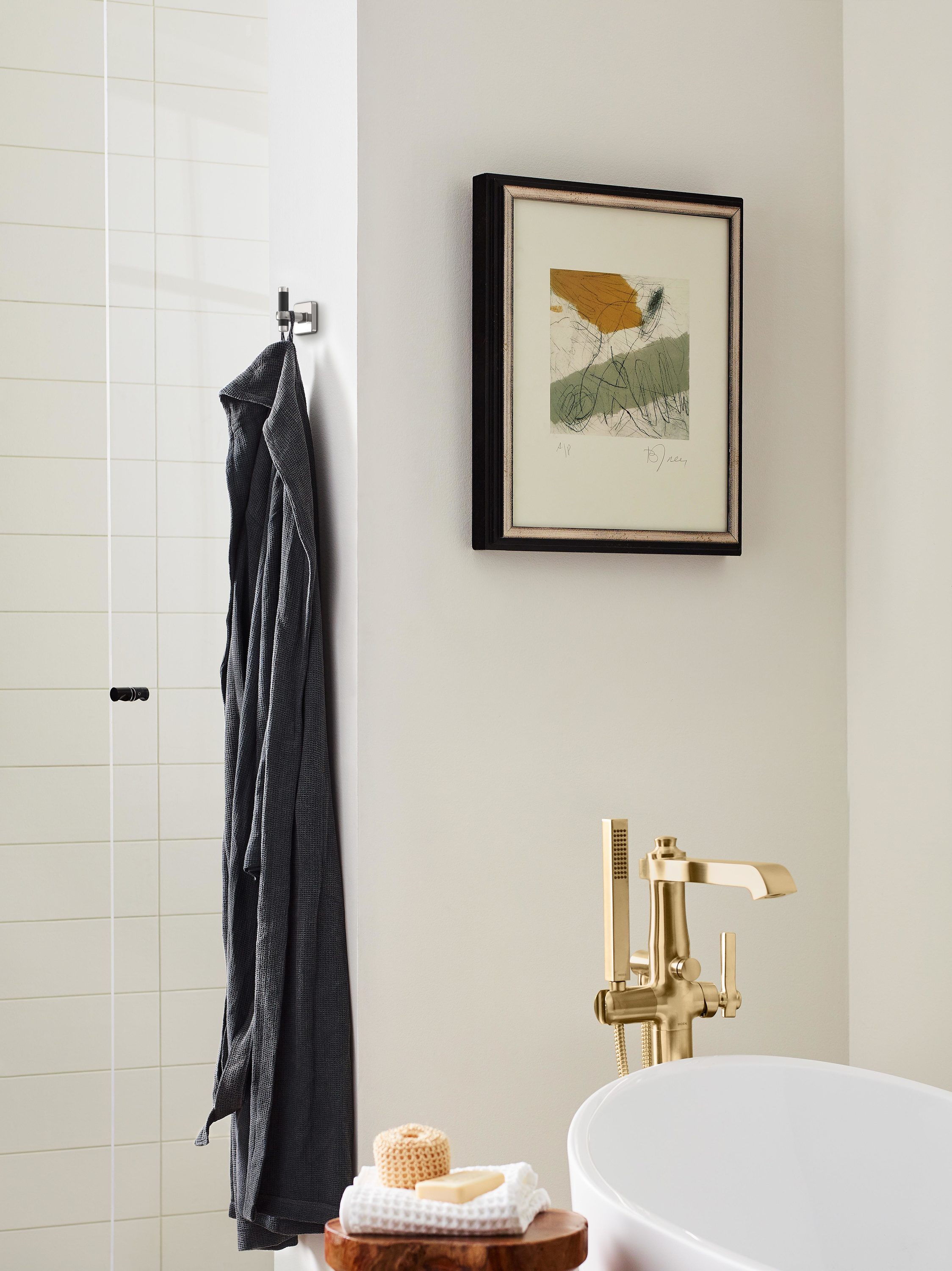 Gancho de toalla montado en la pared, de una sola percha en níquel pulido/bronce negro Esquire de Amerock BH36563PNBBR
