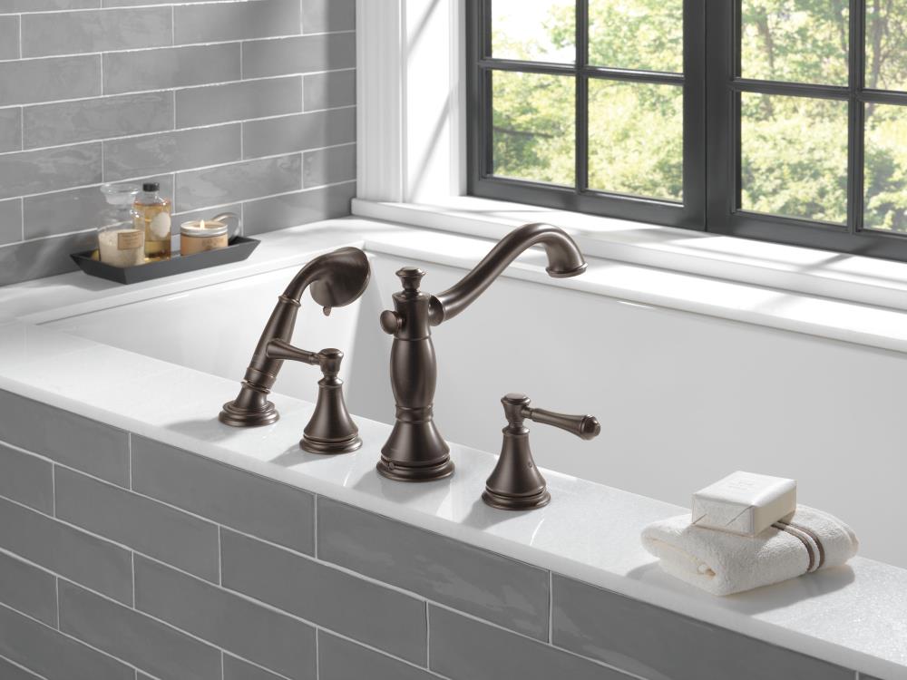 Manija de grifo para bañera con 2 manijas en acabado bronce veneciano Delta H697RB