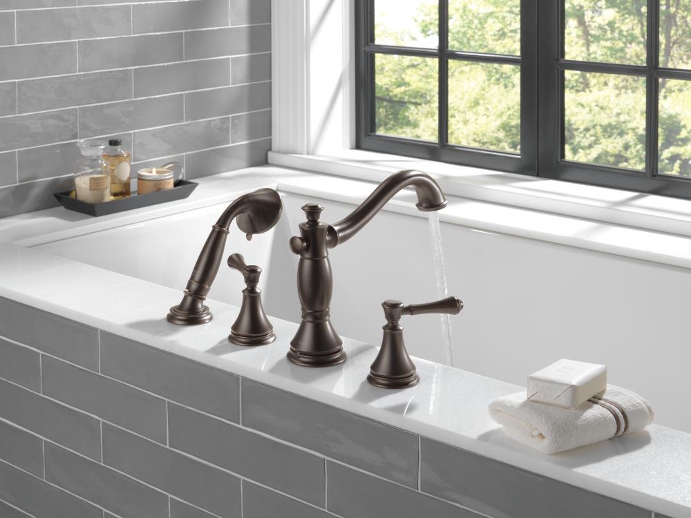 Manija de grifo para bañera con 2 manijas en acabado bronce veneciano Delta H697RB