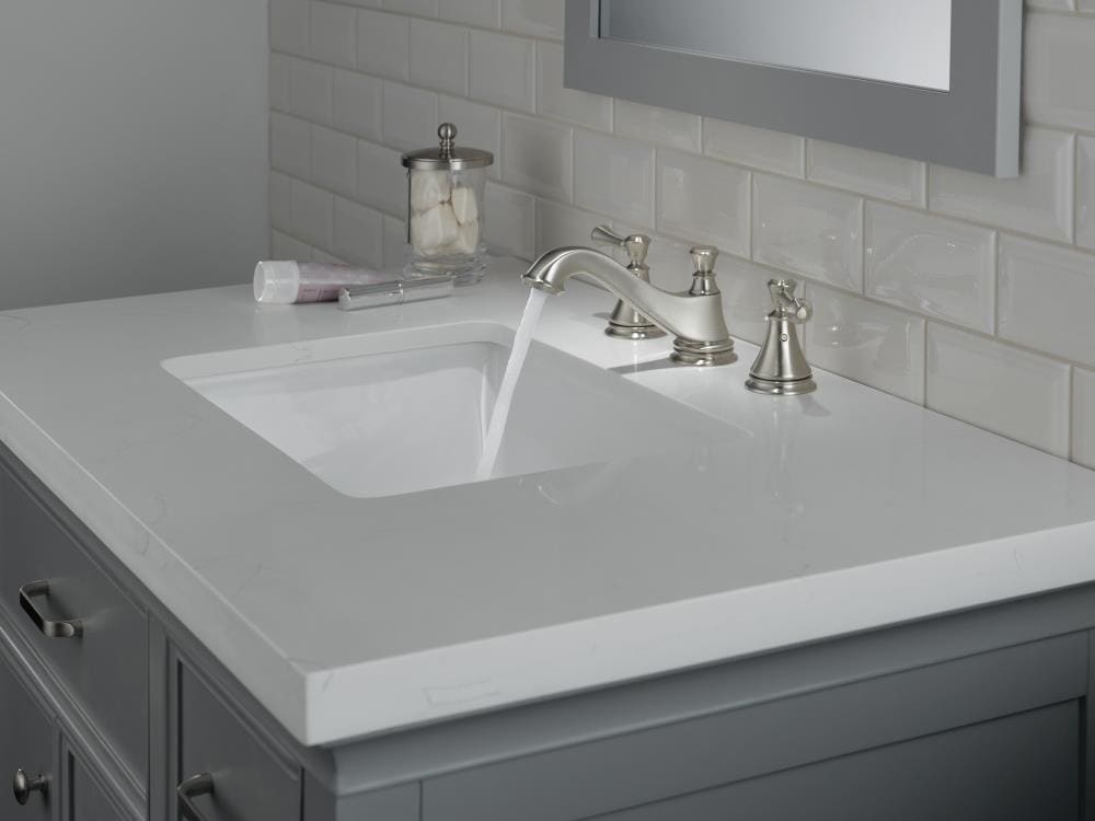 Grifo para lavabo de baño con 2 mangos de palanca de acero inoxidable Delta Stainless, paquete de 2 - H297SS.