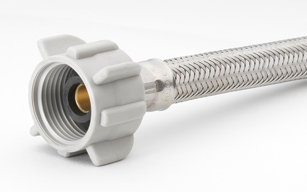 Línea flexible de suministro de acero inoxidable trenzado para inodoro RELIABILT de 3/8 pulgadas flare x 7/8 pulgadas FIP x 12 pulgadas 7233-12-38-3-RB