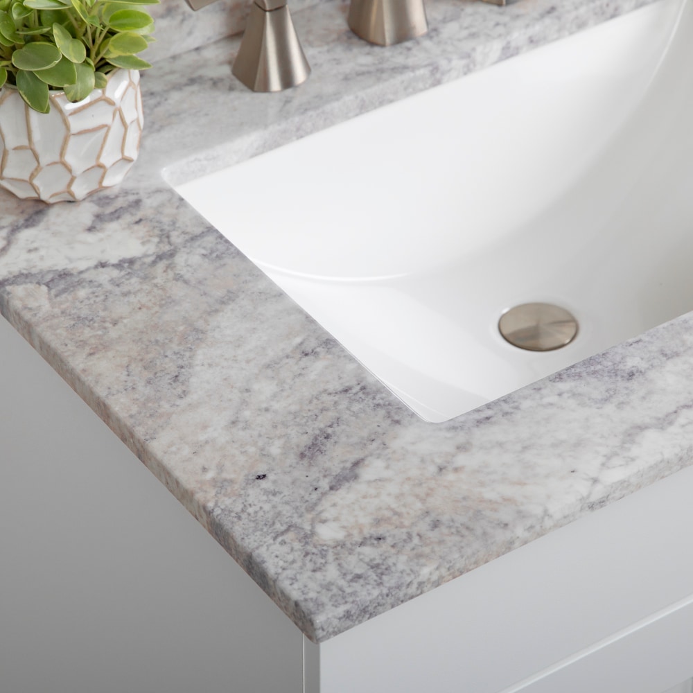 Cubierta de tocador de baño de mármol cultivado Solstice con lavabo individual bajo encimera y 3 orificios de 31 pulgadas x 22 pulgadas de Stone Effects de Style Selections.