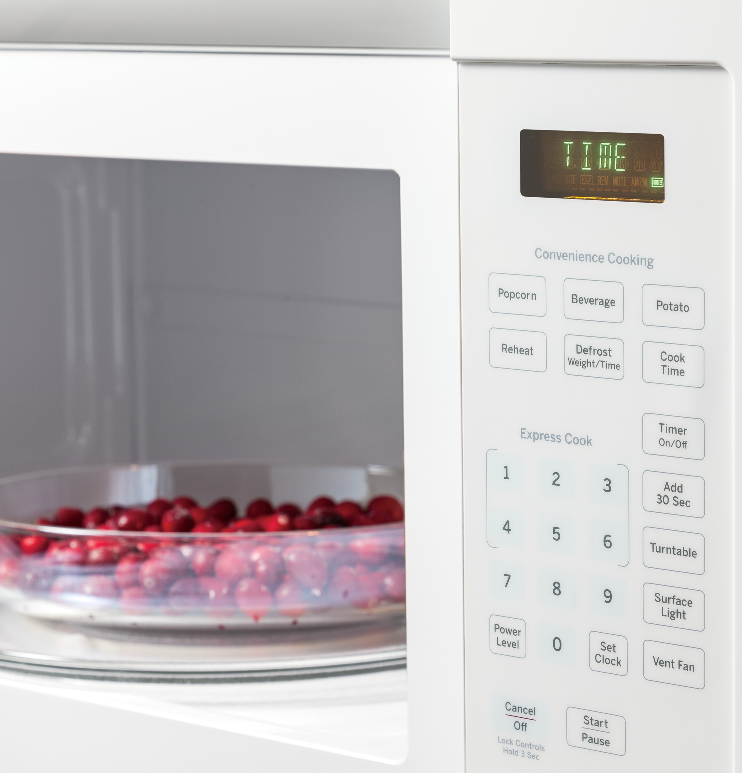 Microondas de 1.6 pies cúbicos sobre la estufa de 29.875 pulgadas (blanco)