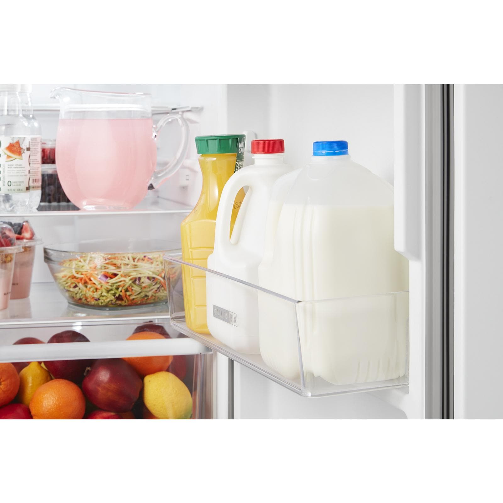 Refrigerador empotrado Whirlpool de 12.9 pies cúbicos, estilo tope, con congelador superior (negro) construido a la medida.