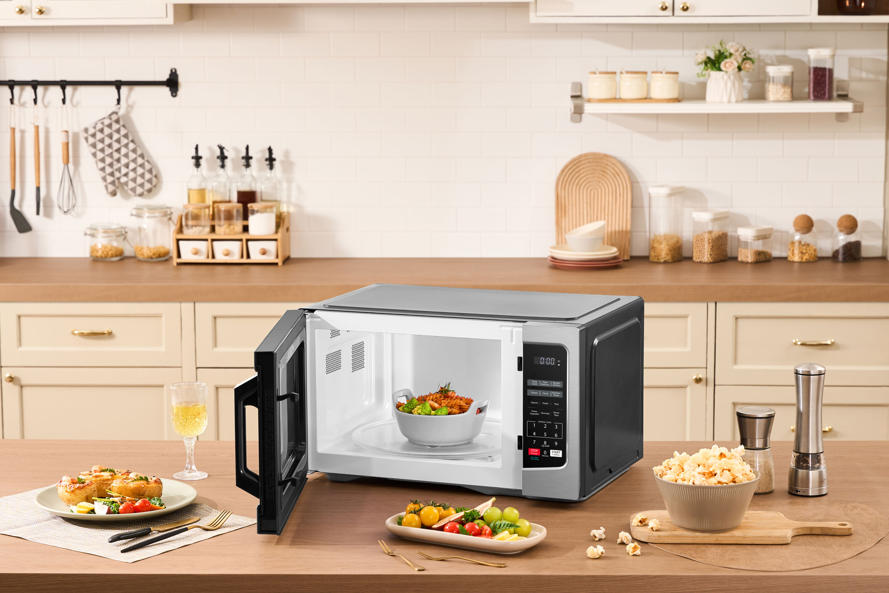 Horno de Microondas de 1.1 pies cúbicos de Mediano con 1000 Watts en Acero Inoxidable para Mostrador (ML-EM32PA(SS))