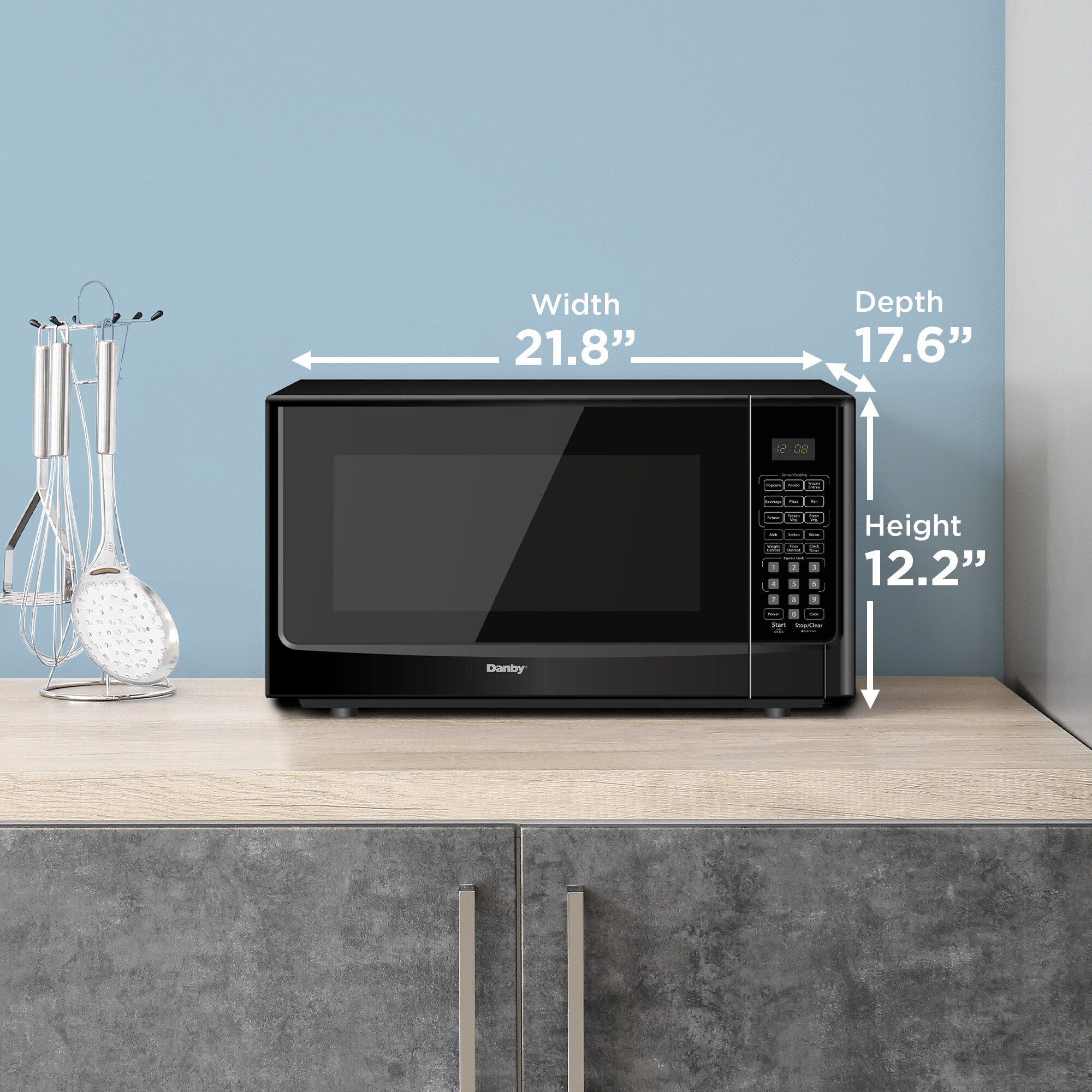 Microondas de Mesa Danby de 1.4 pies cúbicos y 1000 vatios con controles de cocción por sensor (negro)