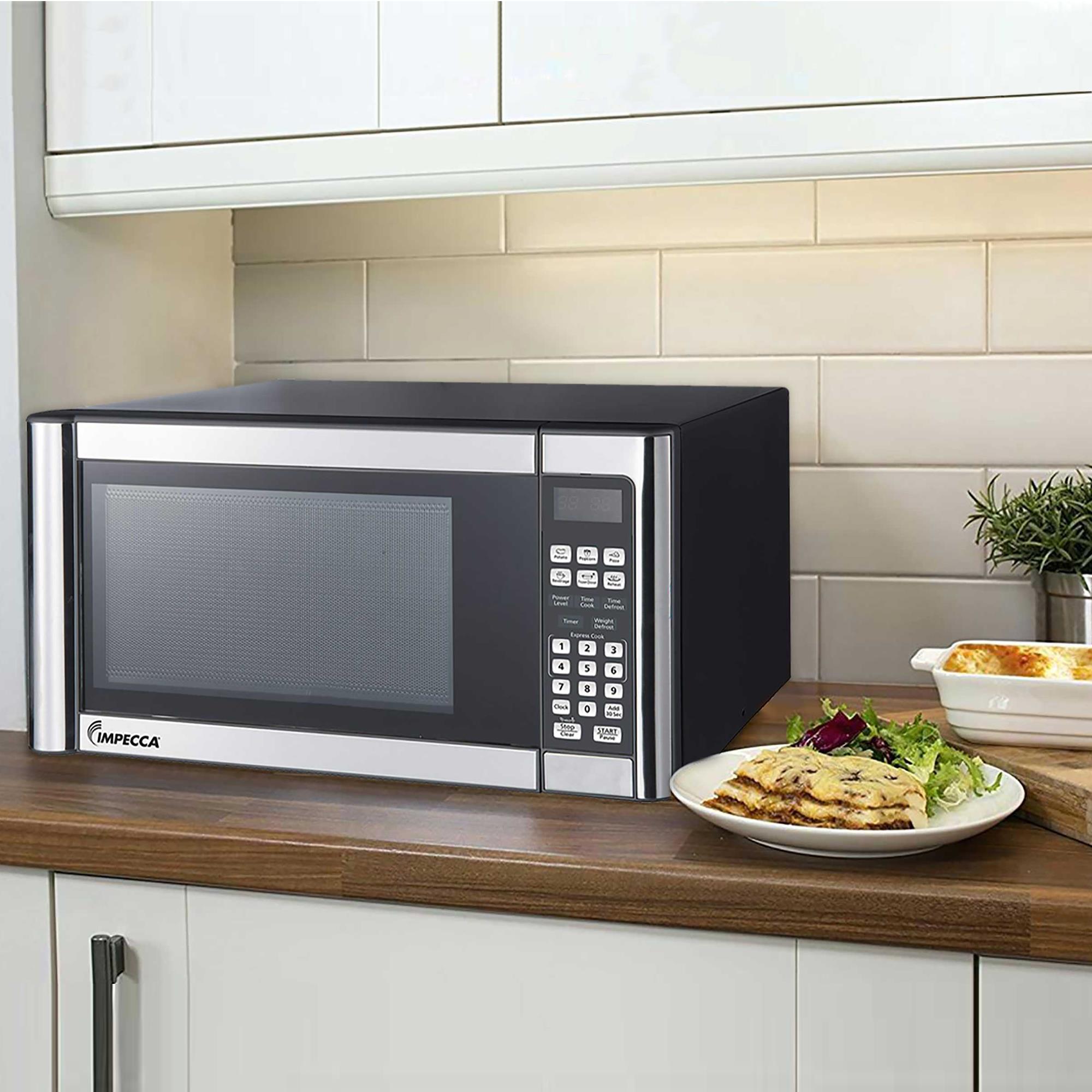 Horno de microondas de encimera de acero inoxidable de 0.7 pies cúbicos (menos de 1.5 pies cúbicos) y 700 vatios Impecca (WCM0771ST697)