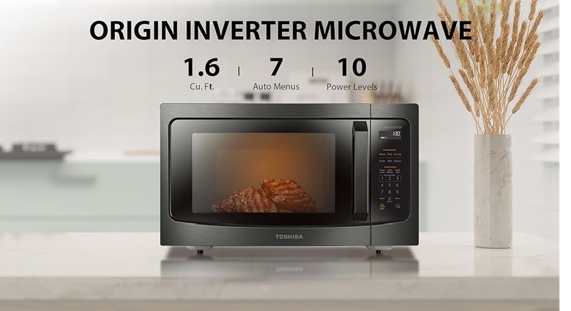 Microondas de mostrador Toshiba de 1.6 pies cúbicos, con controles de cocción por sensor de 1250 vatios, en acero inoxidable negro.