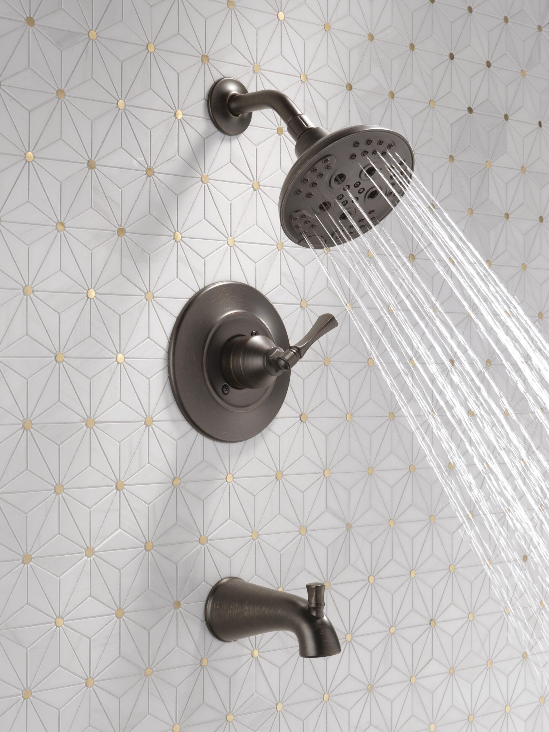 Grifo para bañera y ducha redonda de 6 pulgadas de una sola manija y función múltiple en bronce veneciano Delta Archdale con válvula 144798-RB