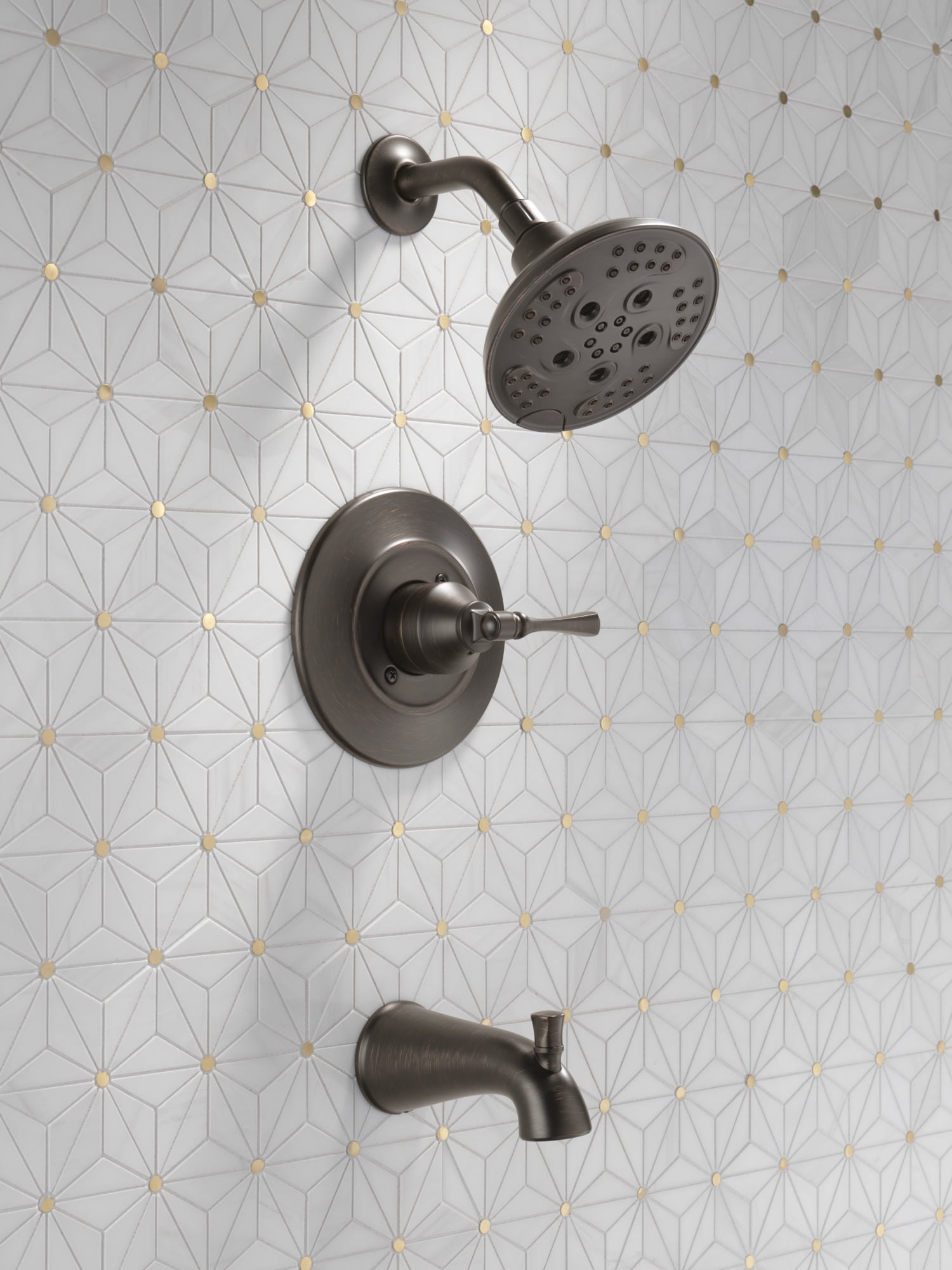 Grifo para bañera y ducha redonda de 6 pulgadas de una sola manija y función múltiple en bronce veneciano Delta Archdale con válvula 144798-RB
