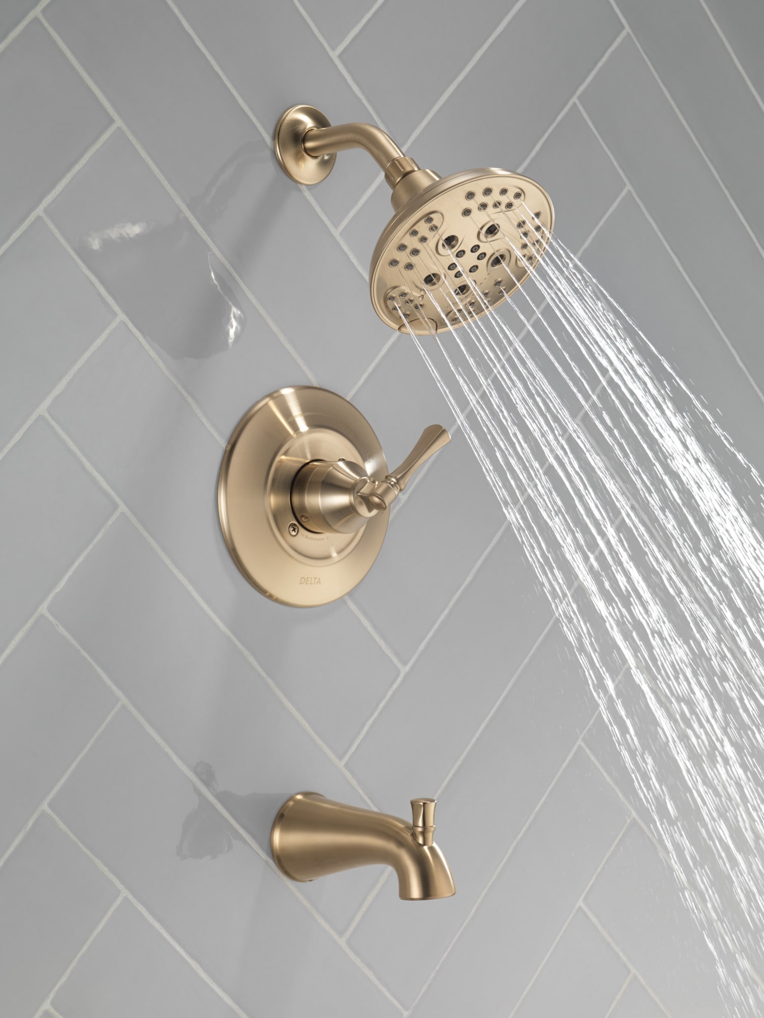 Grifo de bañera y ducha redondo de 6 pulgadas con acabado en bronce champagne de un solo mango y función múltiple de Delta Archdale con válvula 144798-CZ