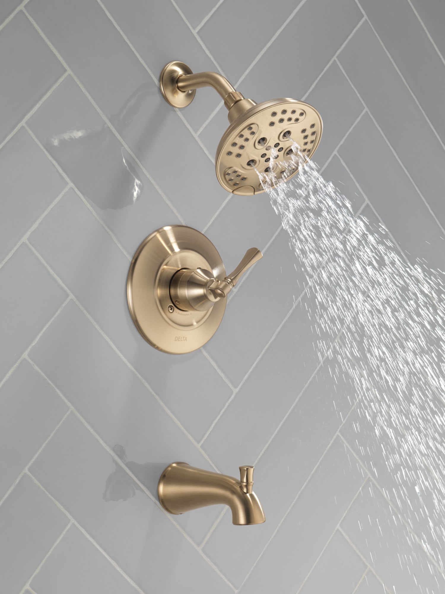Grifo de bañera y ducha redondo de 6 pulgadas con acabado en bronce champagne de un solo mango y función múltiple de Delta Archdale con válvula 144798-CZ