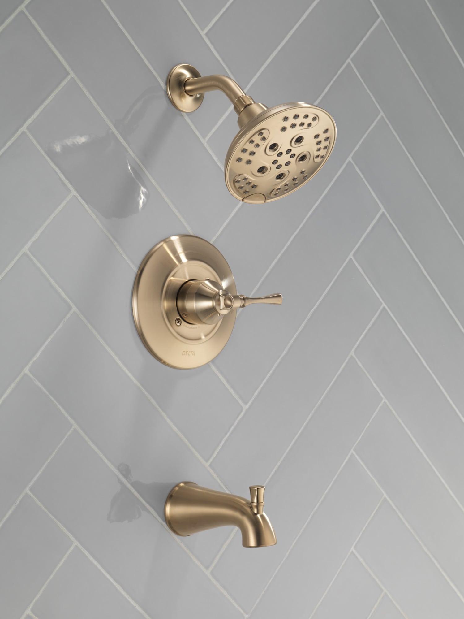 Grifo de bañera y ducha redondo de 6 pulgadas con acabado en bronce champagne de un solo mango y función múltiple de Delta Archdale con válvula 144798-CZ