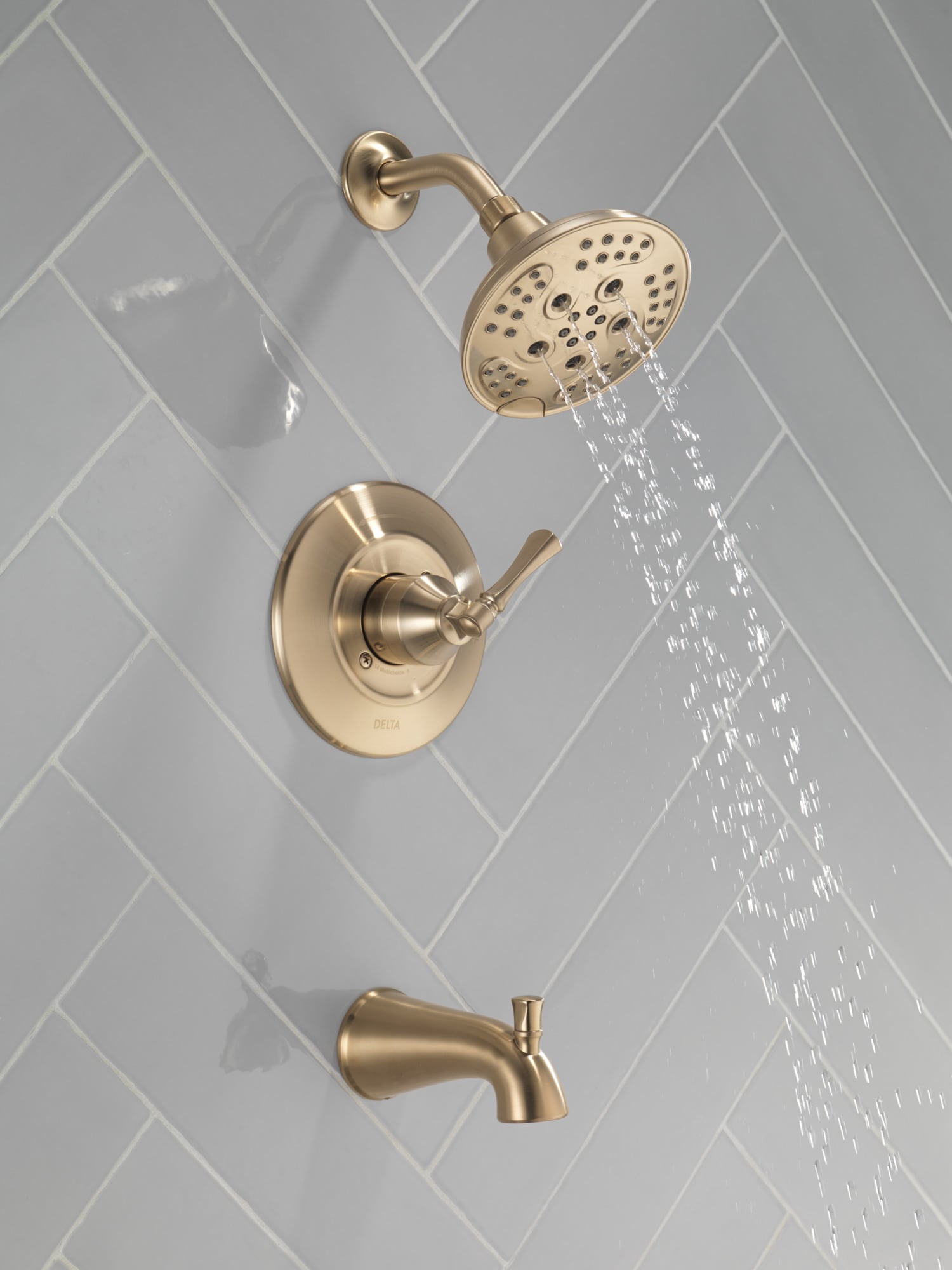 Grifo de bañera y ducha redondo de 6 pulgadas con acabado en bronce champagne de un solo mango y función múltiple de Delta Archdale con válvula 144798-CZ