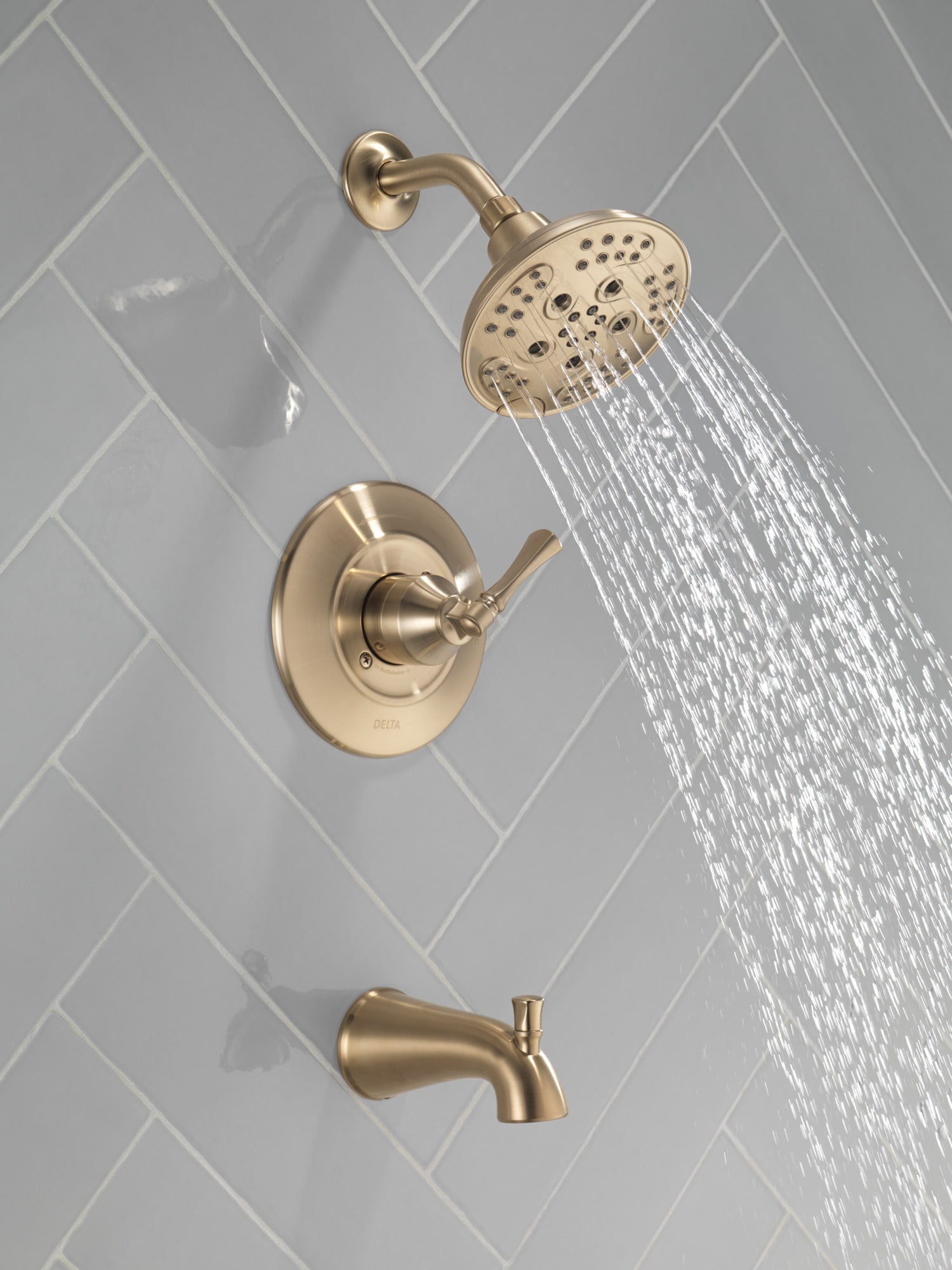 Grifo de bañera y ducha redondo de 6 pulgadas con acabado en bronce champagne de un solo mango y función múltiple de Delta Archdale con válvula 144798-CZ