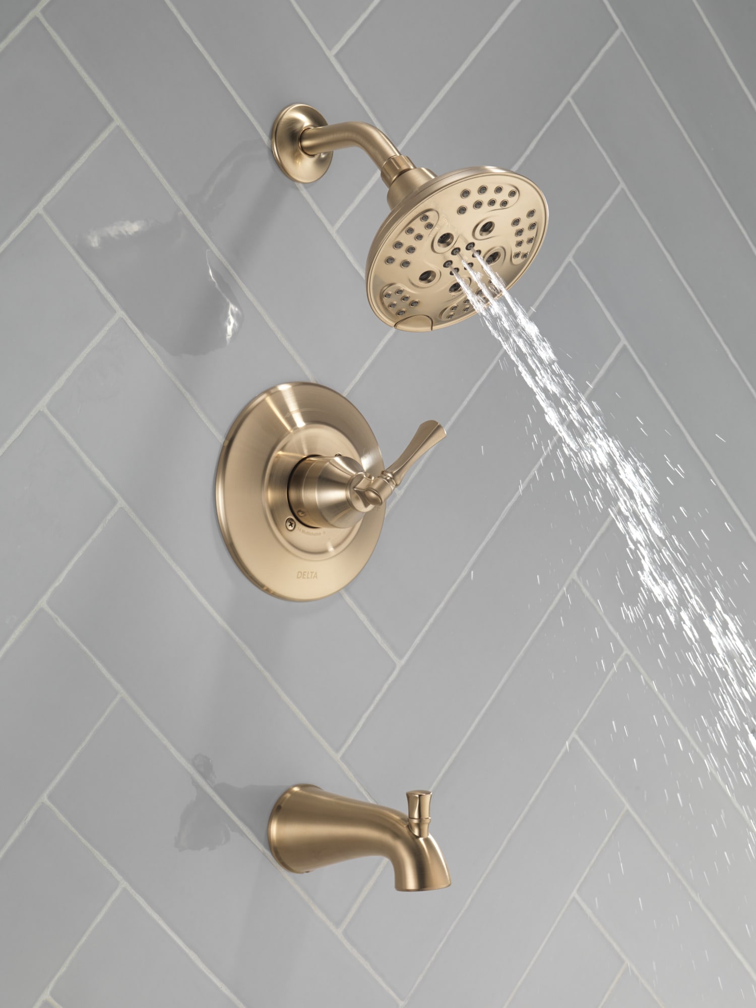 Grifo de bañera y ducha redondo de 6 pulgadas con acabado en bronce champagne de un solo mango y función múltiple de Delta Archdale con válvula 144798-CZ