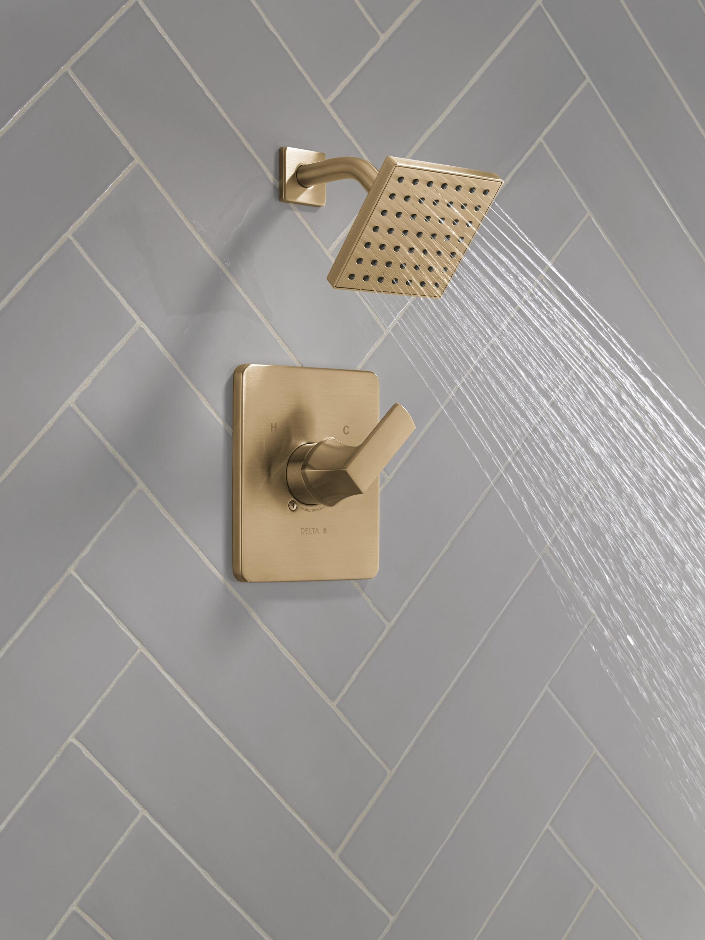 Grifo de bañera y regadera cuadrado de 6.5 pulgadas, color bronce champán de un solo mango y función, modelo Delta Velum T14237-CZ.