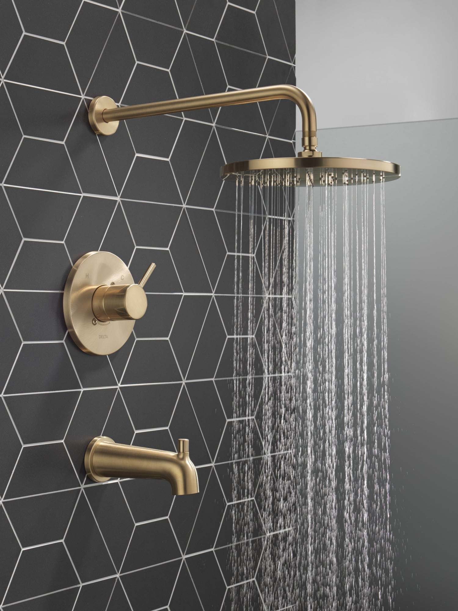Grifo para bañera y ducha redonda de 10 pulgadas, de un solo manejo y función, en acabado bronce champán moderno Delta T14469-CZ-PP.