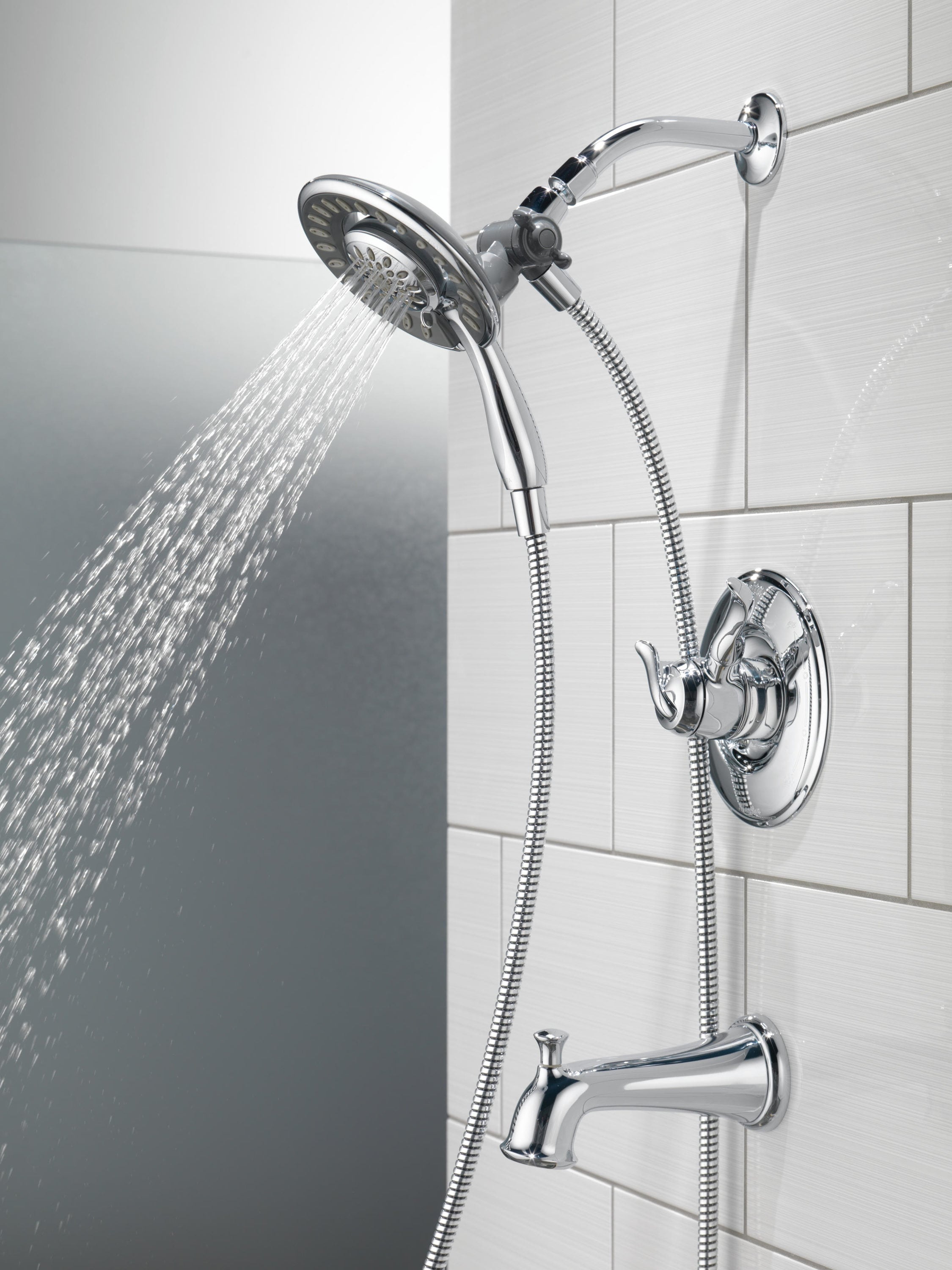 Llave mezcladora para bañera y regadera redonda de 6.1250 pulgadas, multi-función y de doble manija en cromo Delta Linden T17494-I