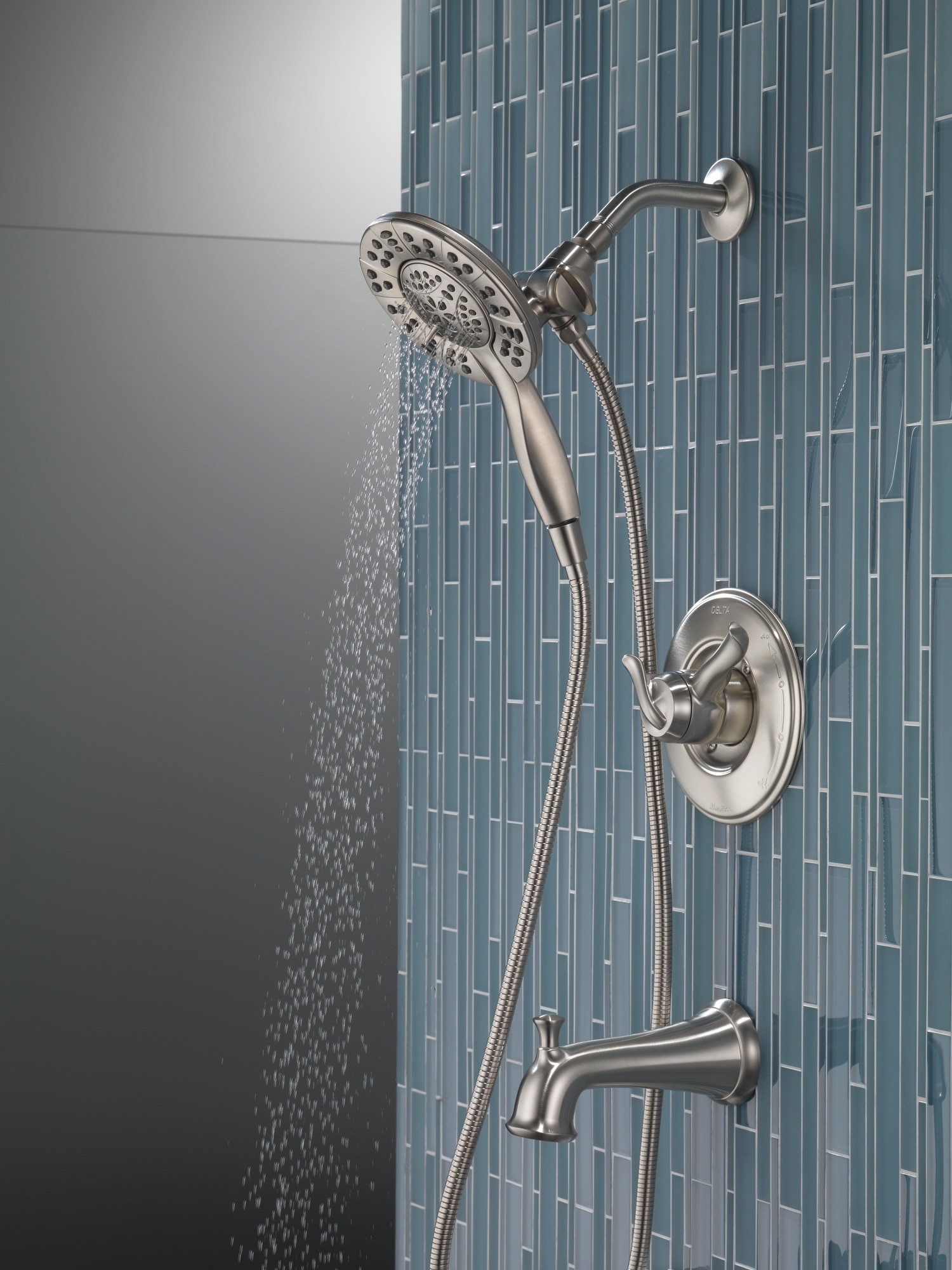 Grifo de bañera y ducha redondo de acero inoxidable Delta Linden con 2 manijas y funciones múltiples de 6.1250 pulgadas - T17494-SS-I
