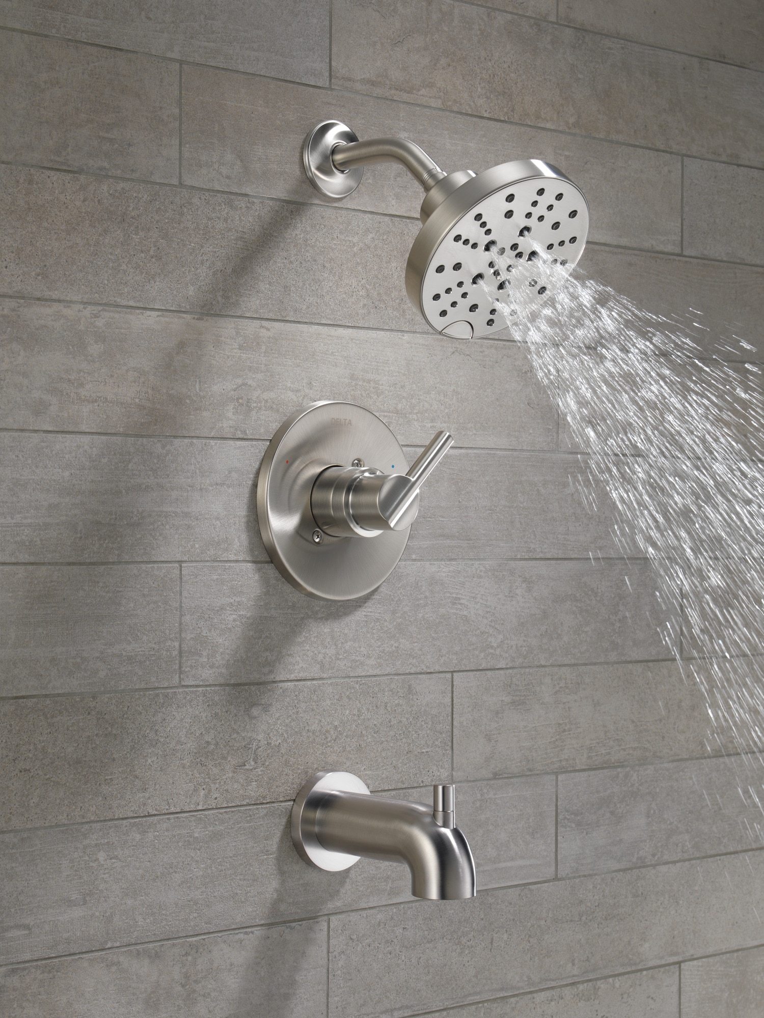 Grifo de bañera y ducha redondo de acero inoxidable con manija única y función múltiple de 6 pulgadas de Delta Nicoli con válvula 144749-SS.