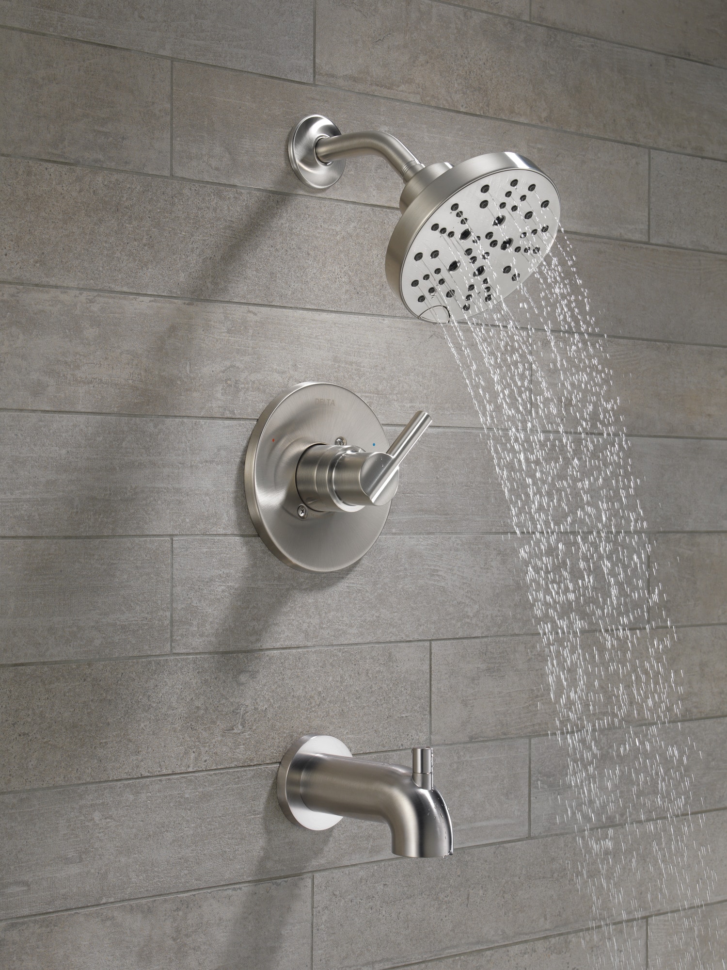 Grifo de bañera y ducha redondo de acero inoxidable con manija única y función múltiple de 6 pulgadas de Delta Nicoli con válvula 144749-SS.