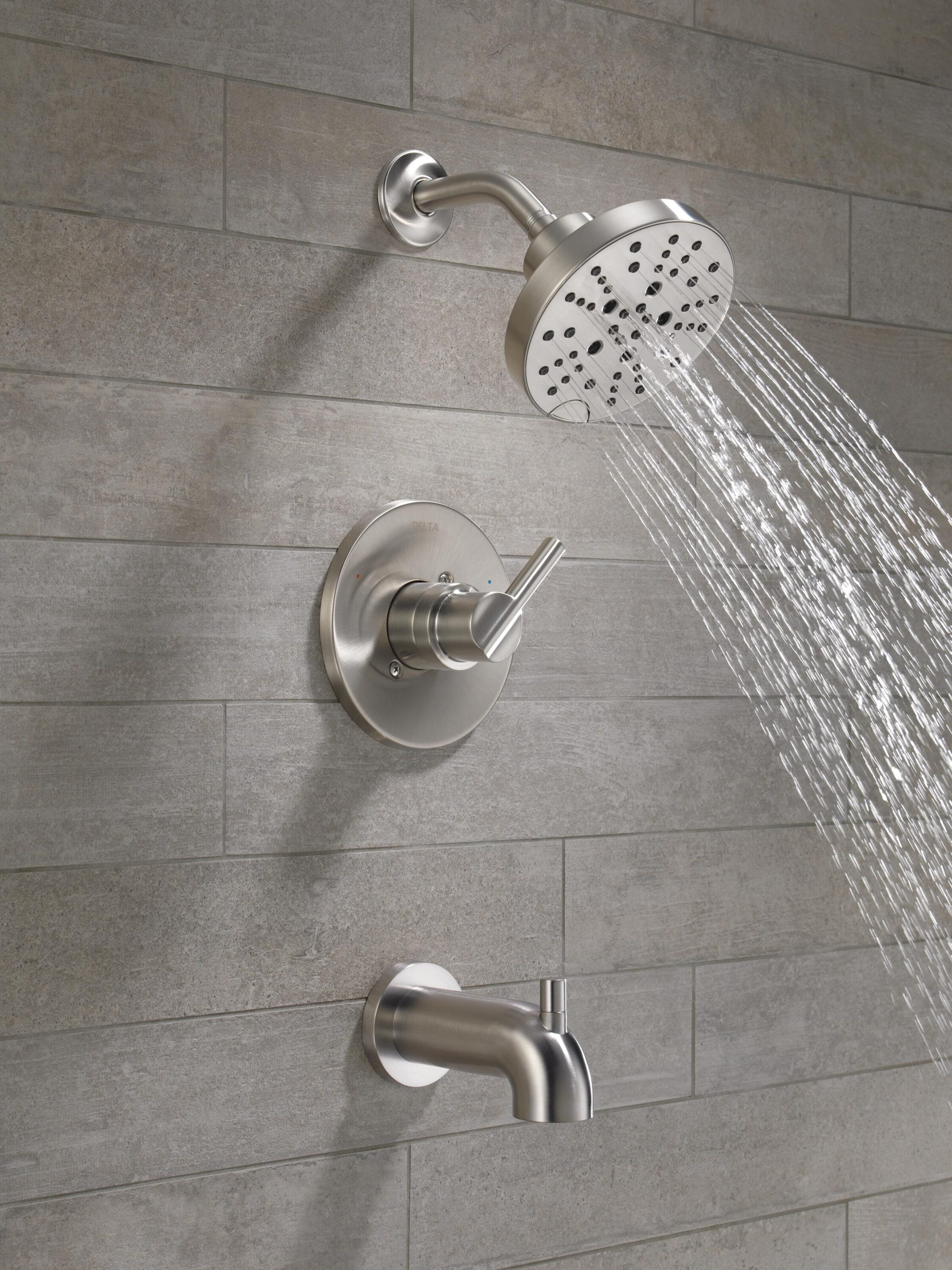 Grifo de bañera y ducha redondo de acero inoxidable con manija única y función múltiple de 6 pulgadas de Delta Nicoli con válvula 144749-SS.