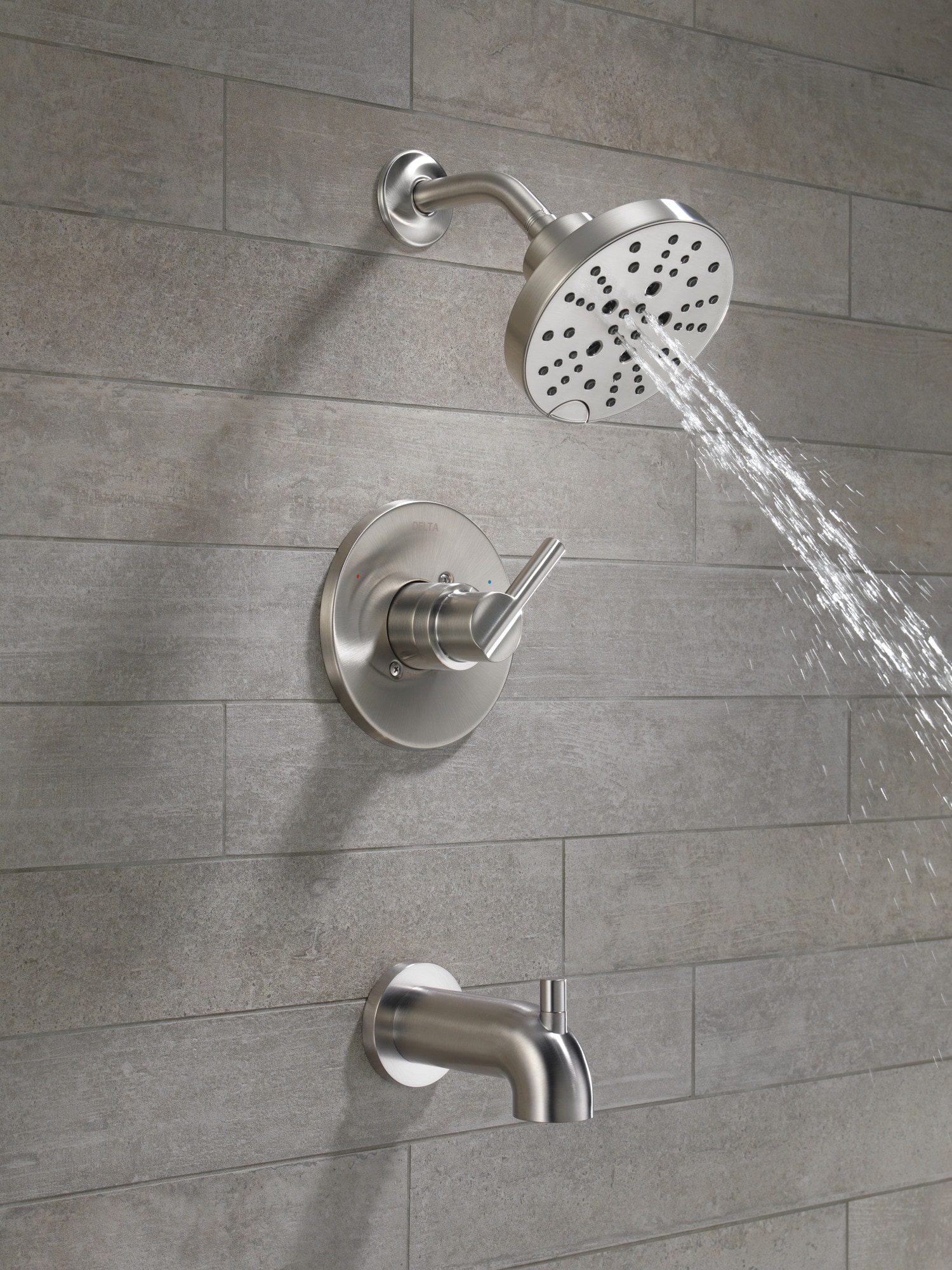 Grifo de bañera y ducha redondo de acero inoxidable con manija única y función múltiple de 6 pulgadas de Delta Nicoli con válvula 144749-SS.