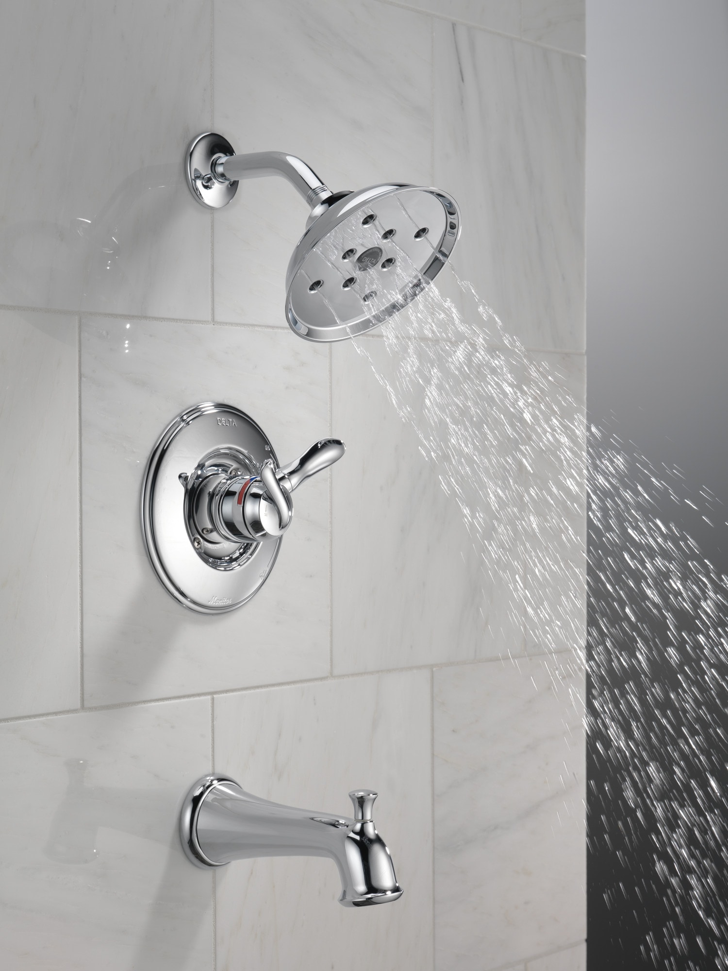 Grifo para bañera y ducha de ronda de 6.1250 pulgadas de función única con dos manijas en bronce champagne Delta Linden T17494-CZ.