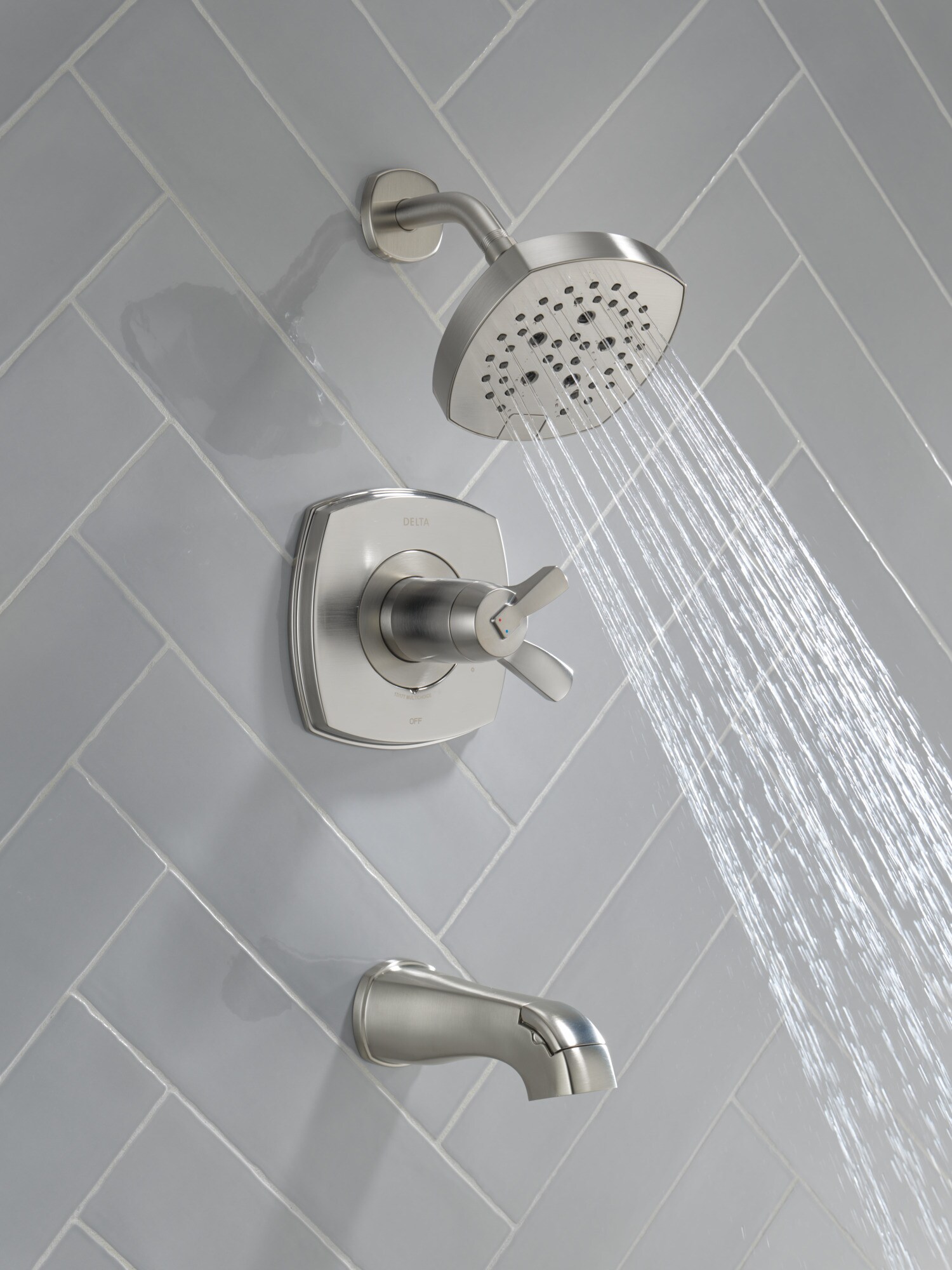 Grifo para bañera y ducha redonda de 7.0 pulgadas con un mango, acabado en acero inoxidable y multi-función Delta Stryke Lumicoat T17T476-SS-PR