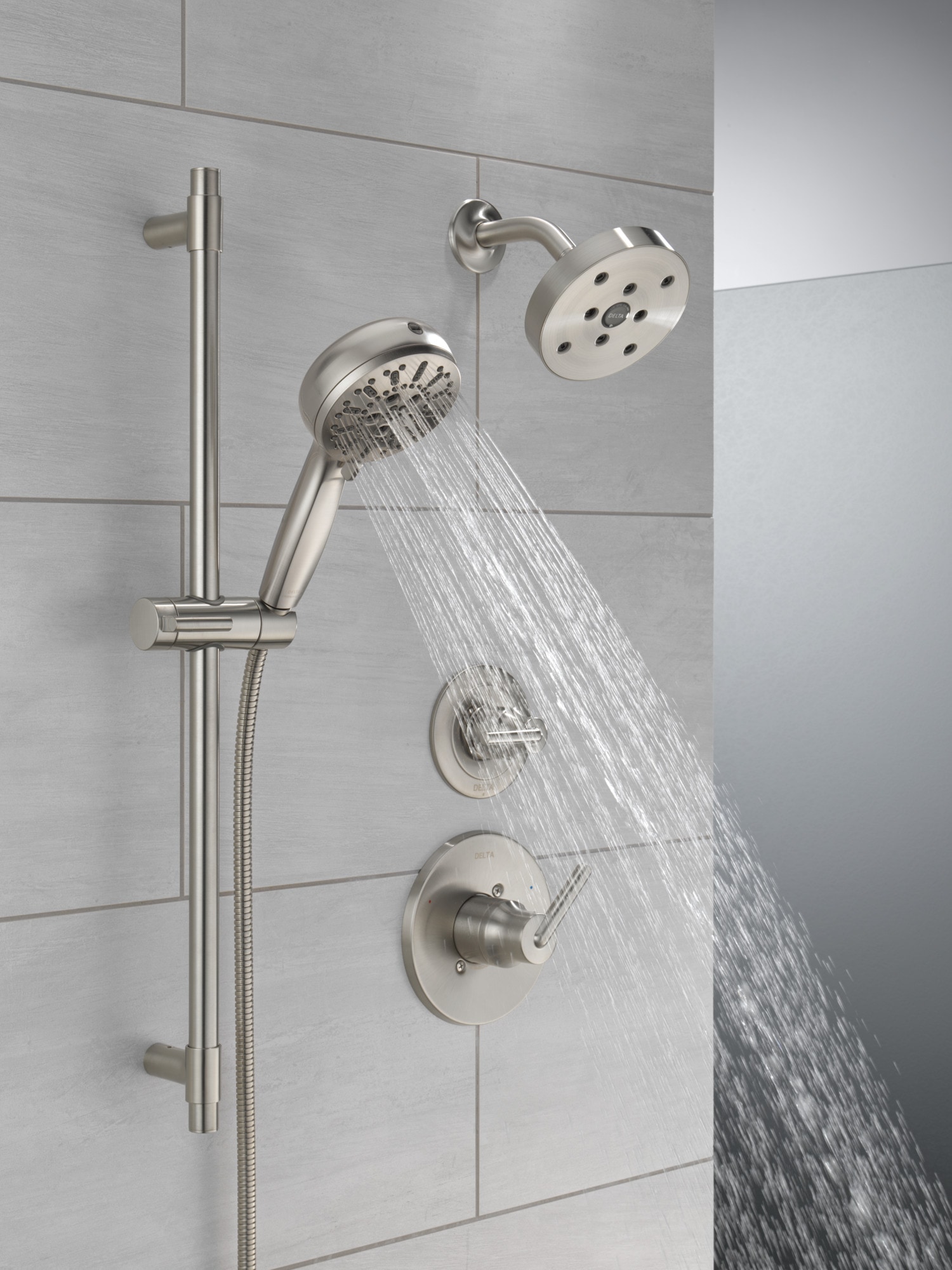 Grifo de ducha redondo de acero inoxidable con manija única y función única de 5.4 pulgadas, marca Delta Trinsic