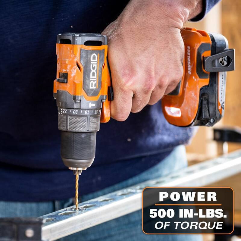 Traducción: Juego de Taladro Percutor Inalámbrico RIDGID 18V SubCompact con Motor Brushless de 1/2 pulgadas, incluye (2) Baterías de 2.0 Ah, Cargador y Bolsa - R87112K