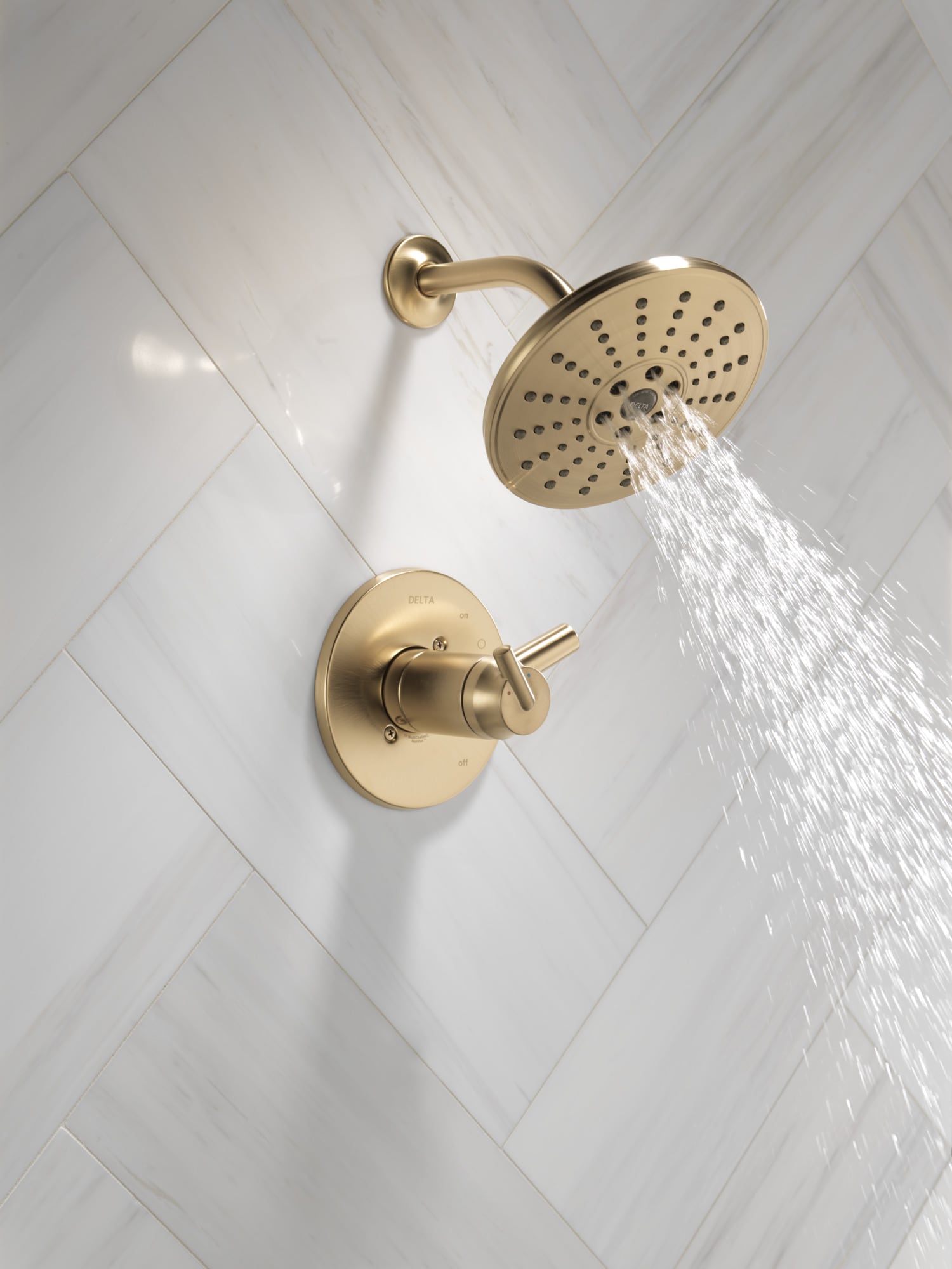 Grifo para ducha redondo de dos manijas en bronce champán Trinsic de Delta, función única de 7.625 pulgadas, modelo T17T259-CZH2O.