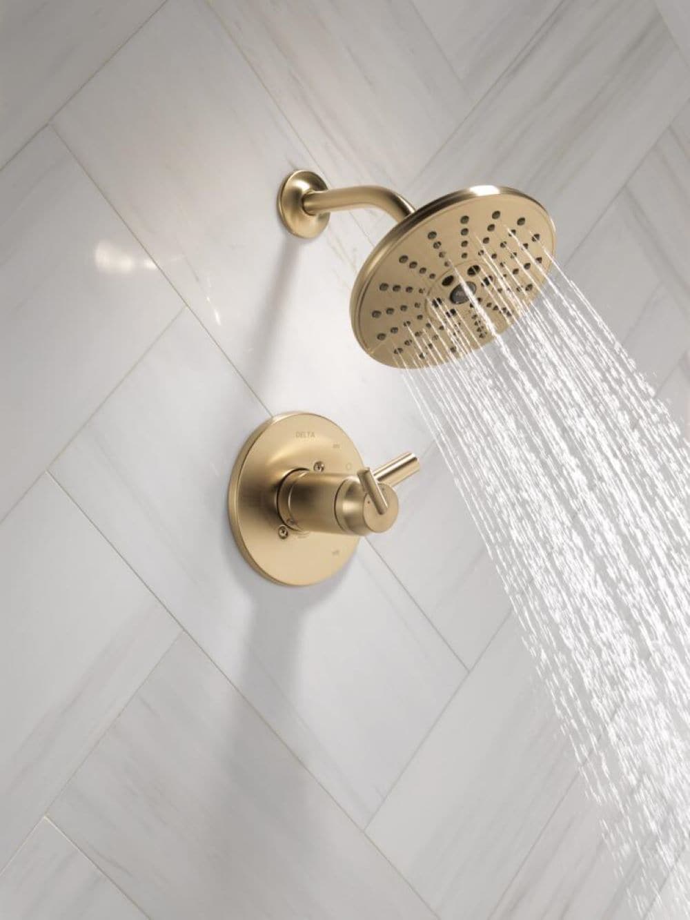Grifo para ducha redondo de dos manijas en bronce champán Trinsic de Delta, función única de 7.625 pulgadas, modelo T17T259-CZH2O.