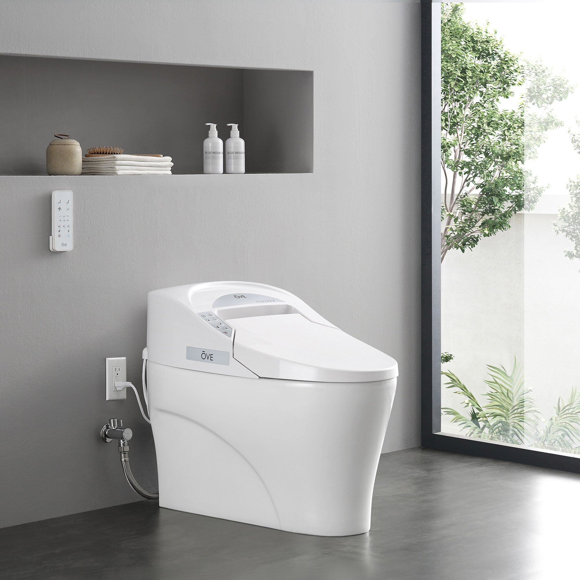 Sanitario alargado individual blanco OVE Decors con cierre suave inteligente, etiquetado WaterSense de 1.28 GPF y conexión de 12 pulgadas.