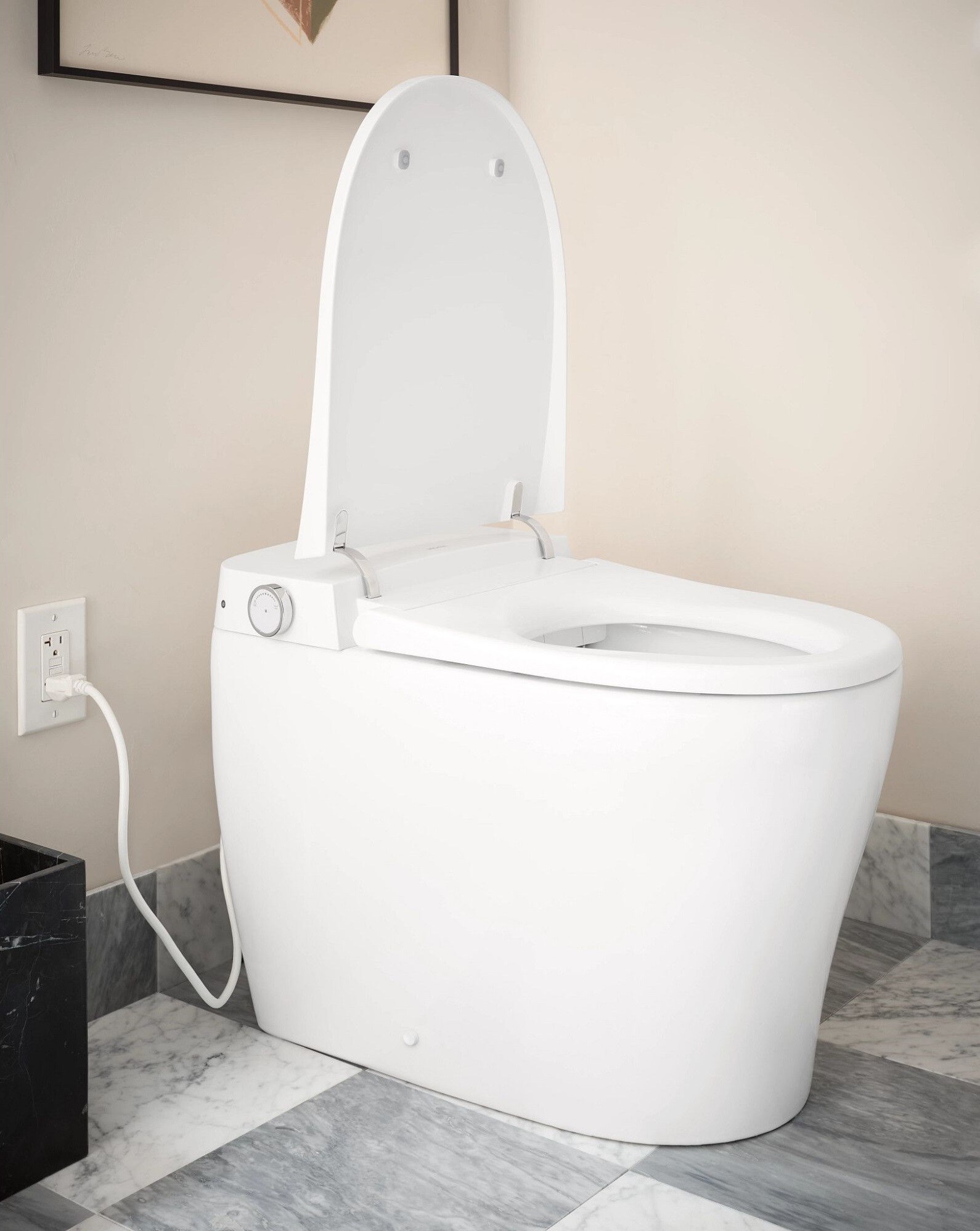 Bidet inteligente de una pieza con altura de silla alargada y cierre suave en color blanco de Moen