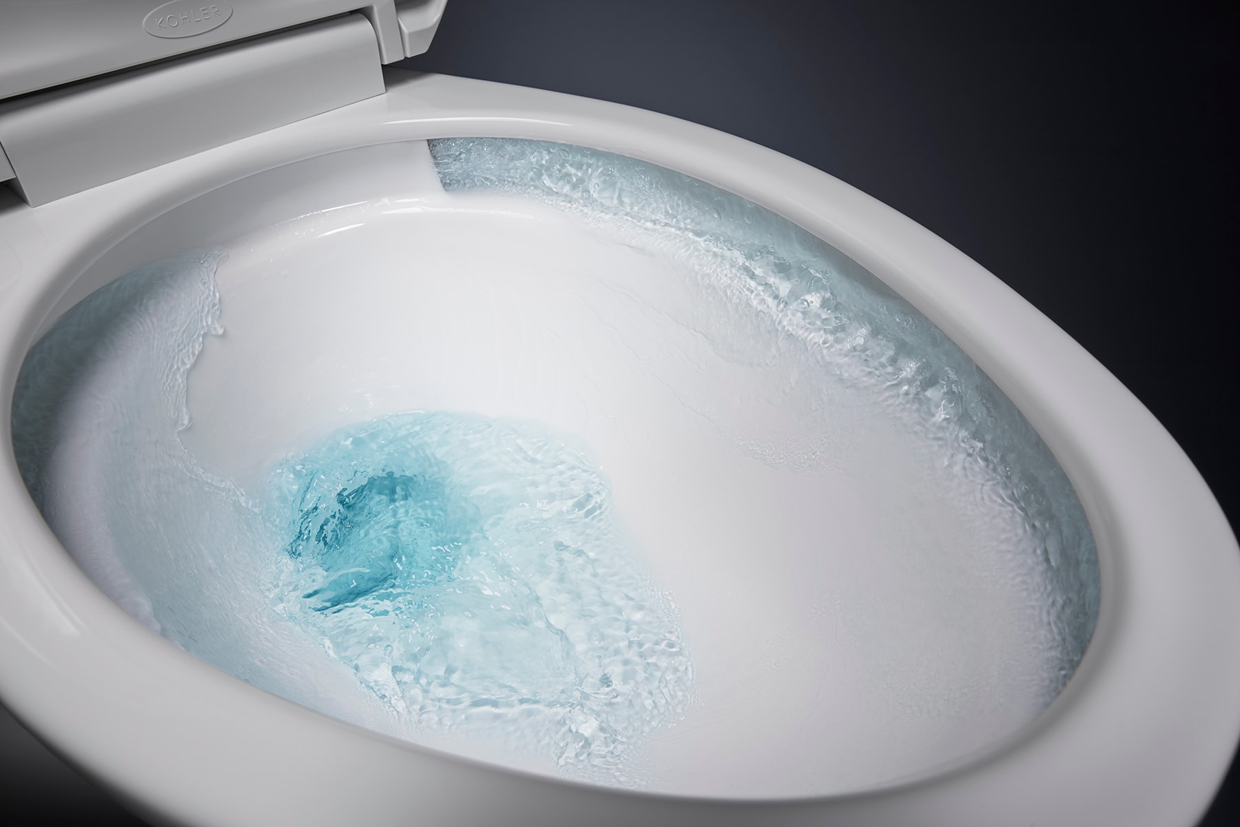 Taza de baño alargada a altura de silla en color hueso Cimarron de KOHLER con rough-in de 12 pulgadas 31588-96