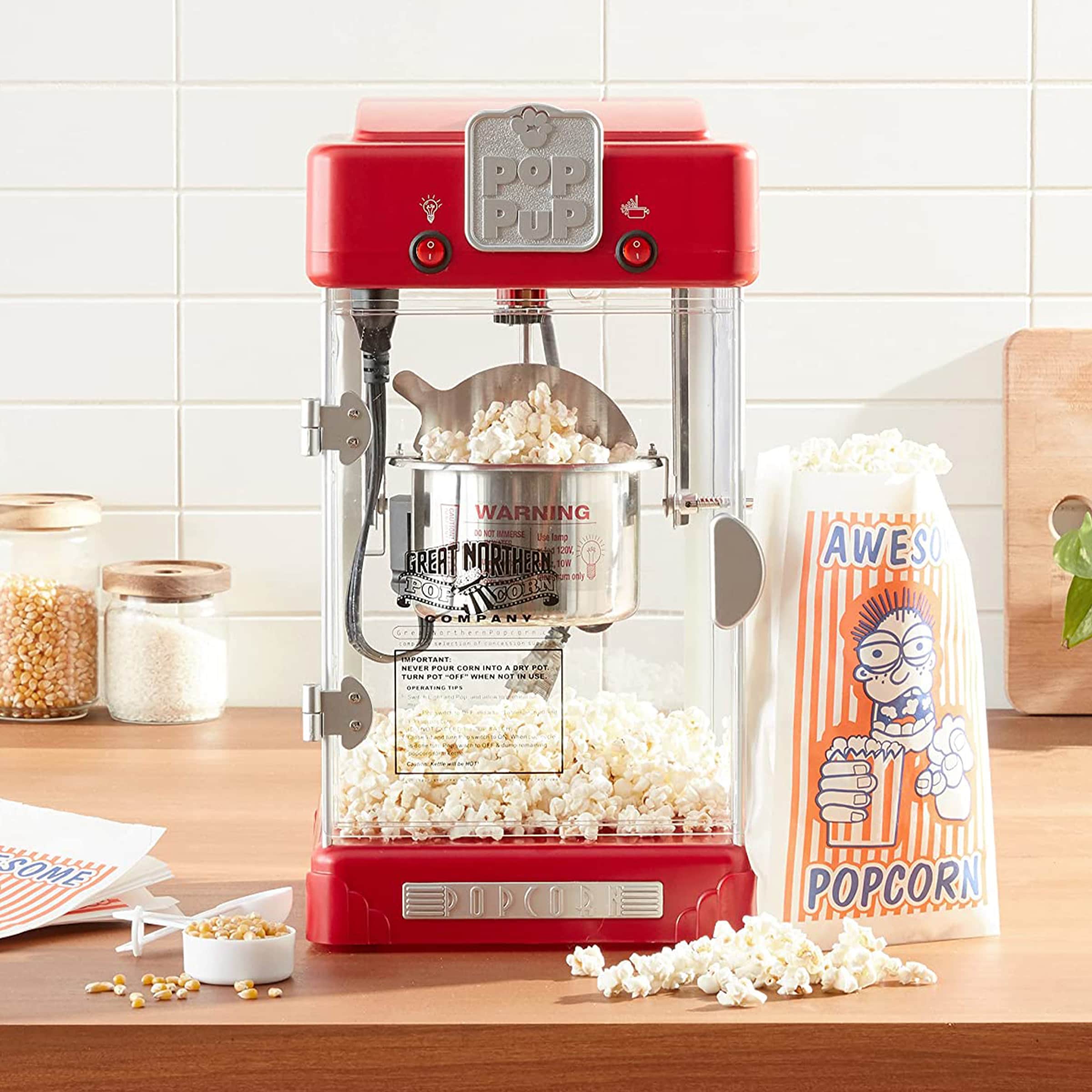 Máquina de palomitas de maíz para la encimera con aceite rojo de 0.5 tazas de Great Northern Popcorn 253146VWR.