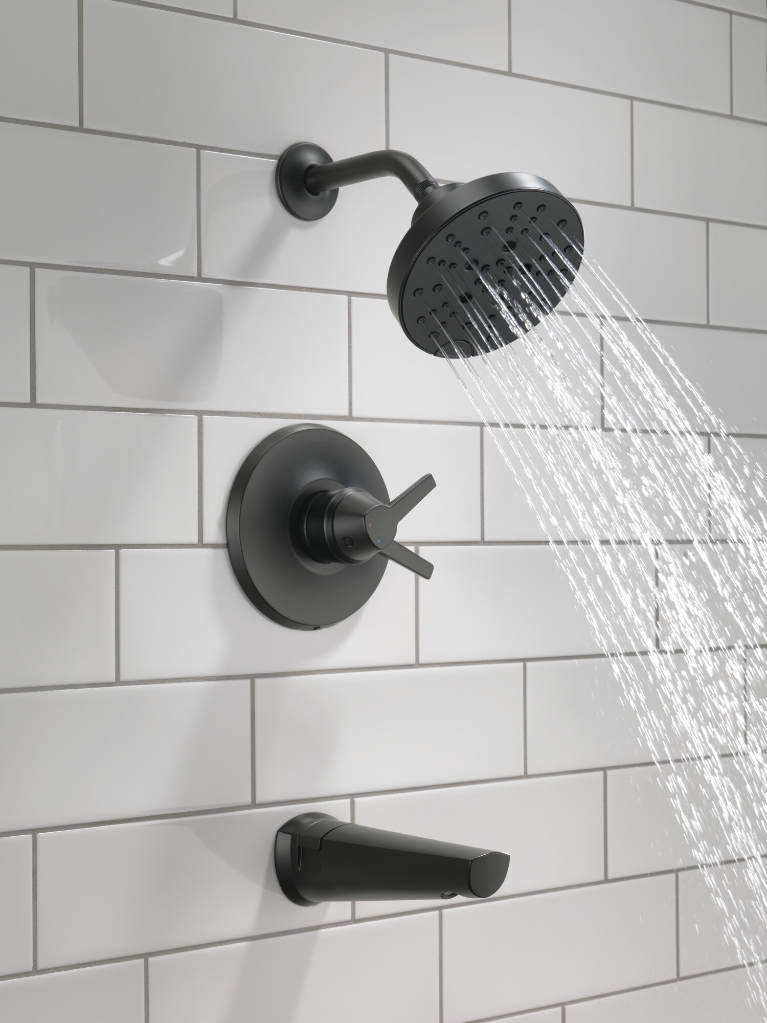 Grifo para bañera y regadera redonda de 6 pulgadas con 2 manijas en negro mate Modelo Galeón de Delta T17472-BL