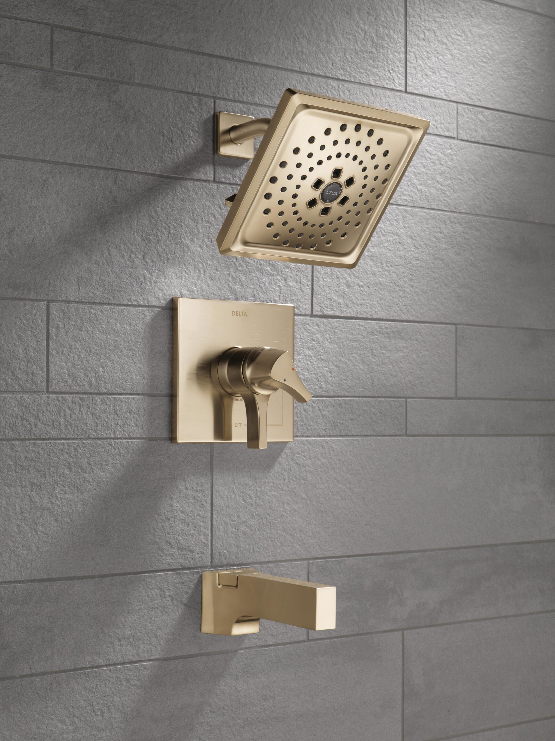 Grifería para bañera y ducha de dos manijas en color bronce champagne Delta Zura de función múltiple de 6.63 pulgadas cuadradas T17474-CZ.