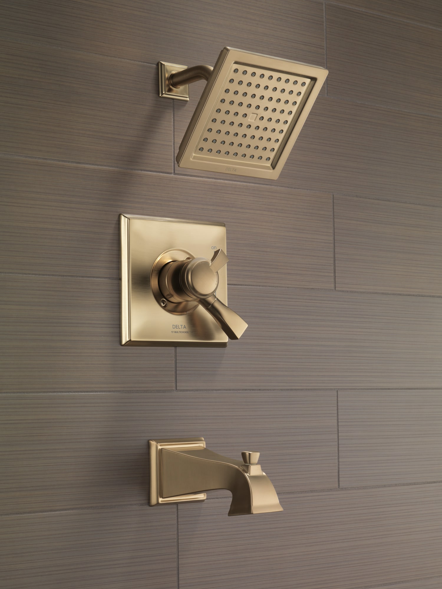 Grifo de bañera y ducha cuadrado de 6.5625 pulgadas con dos manijas en color bronce champan Delta Dryden
