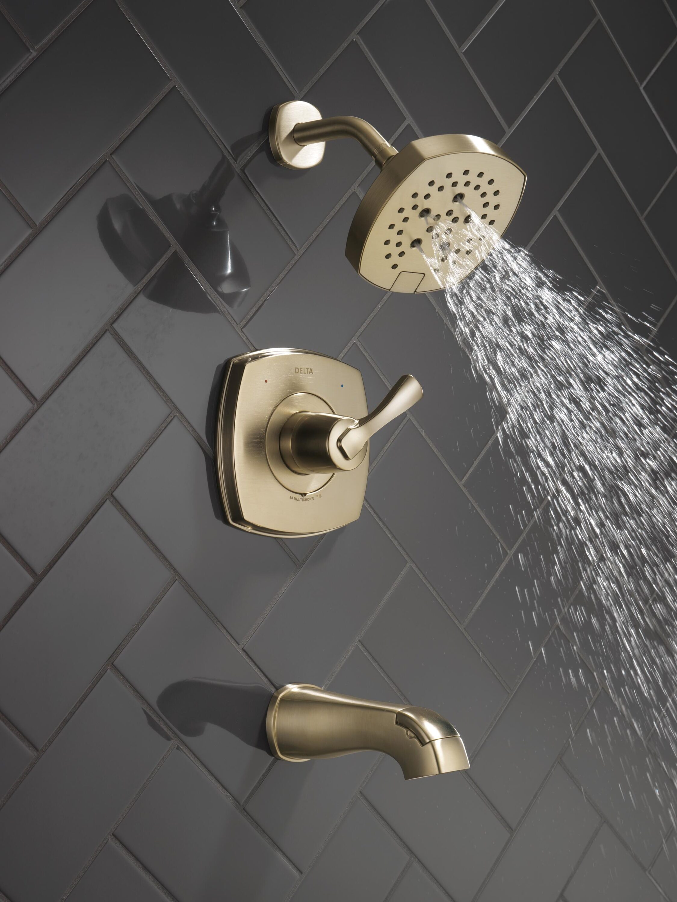 Grifo de bañera y ducha redonda de 7.0 pulgadas de una sola manija en acabado bronce champan Lumicoat Delta Stryke