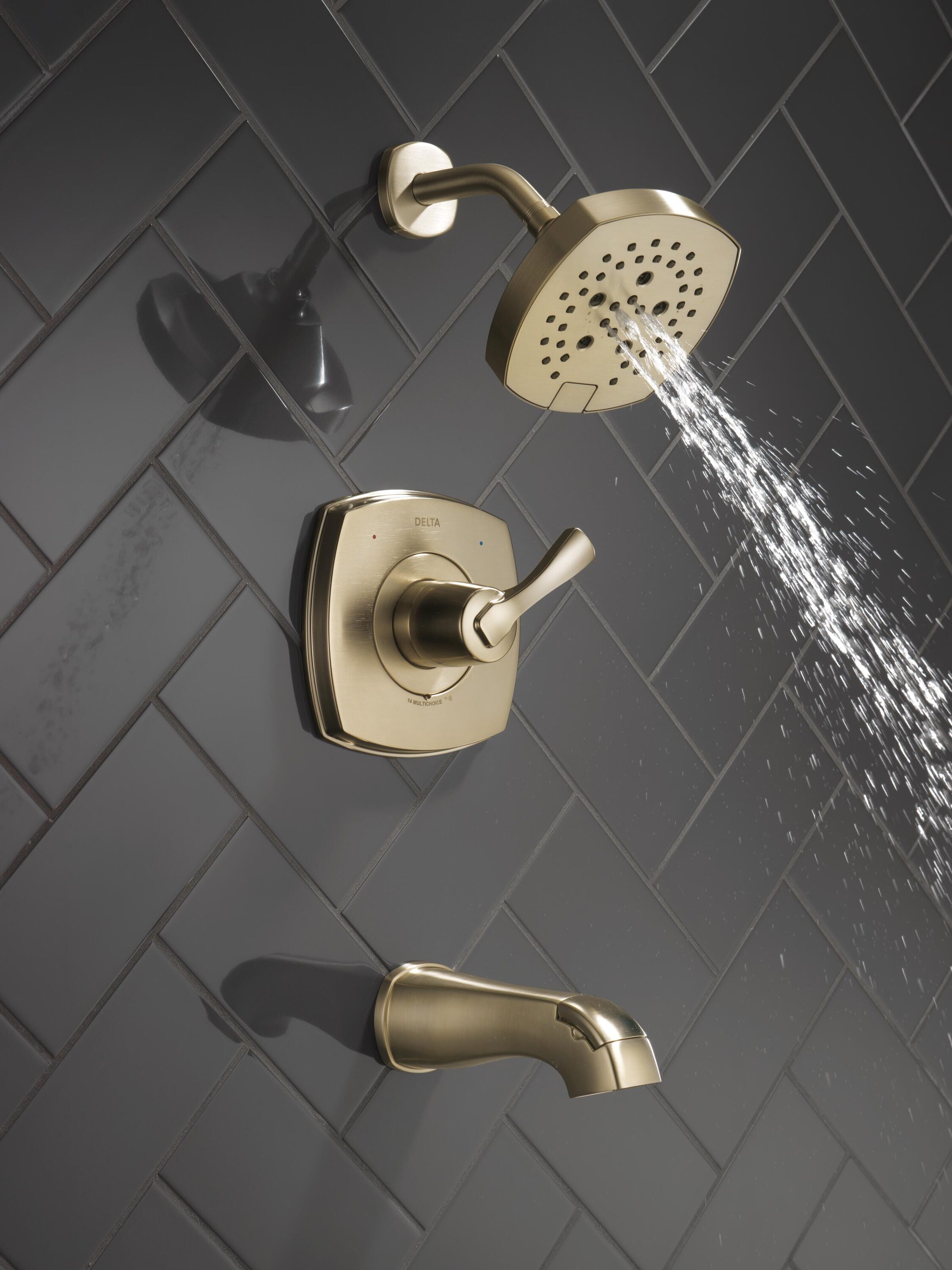 Grifo de bañera y ducha redonda de 7.0 pulgadas de una sola manija en acabado bronce champan Lumicoat Delta Stryke